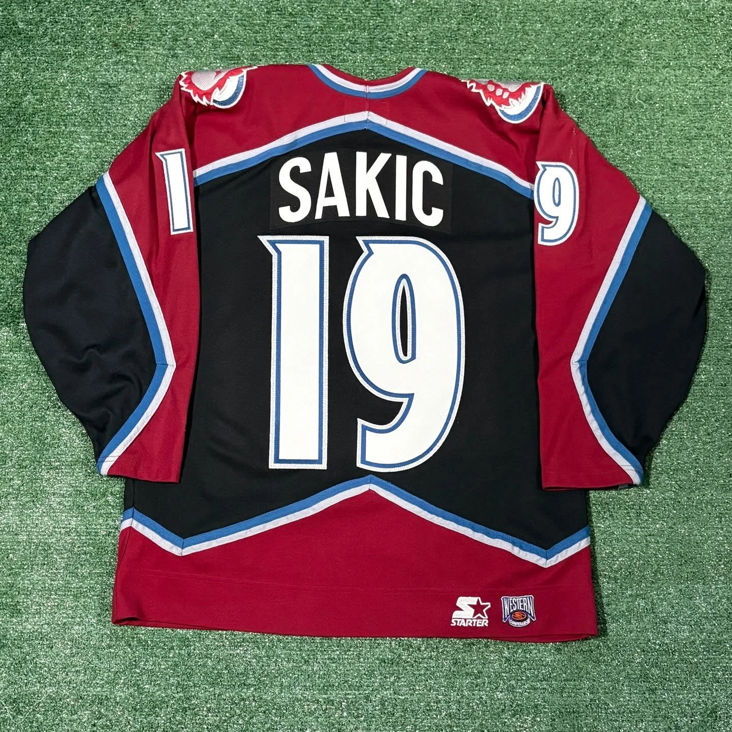 Joe Sakic Avalanche Starter Fashion Jersey

The crests on these SUCK, but Starter made some sweet designs back in the late 90&rsquo;s, and this is no exception! Glacier and metallic twill used in this kit.

Full kit made in-house.