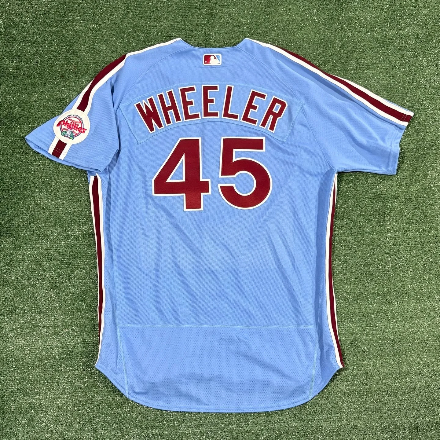 Zack Wheeler Phillies &ldquo;Throwback Thursday&rdquo; Jersey

The Phillies&rsquo; updated throwback number font is similar, but NOT the same as the font used pre-1993. The lettering on these jerseys is done with stacked twill (red over white), rathe