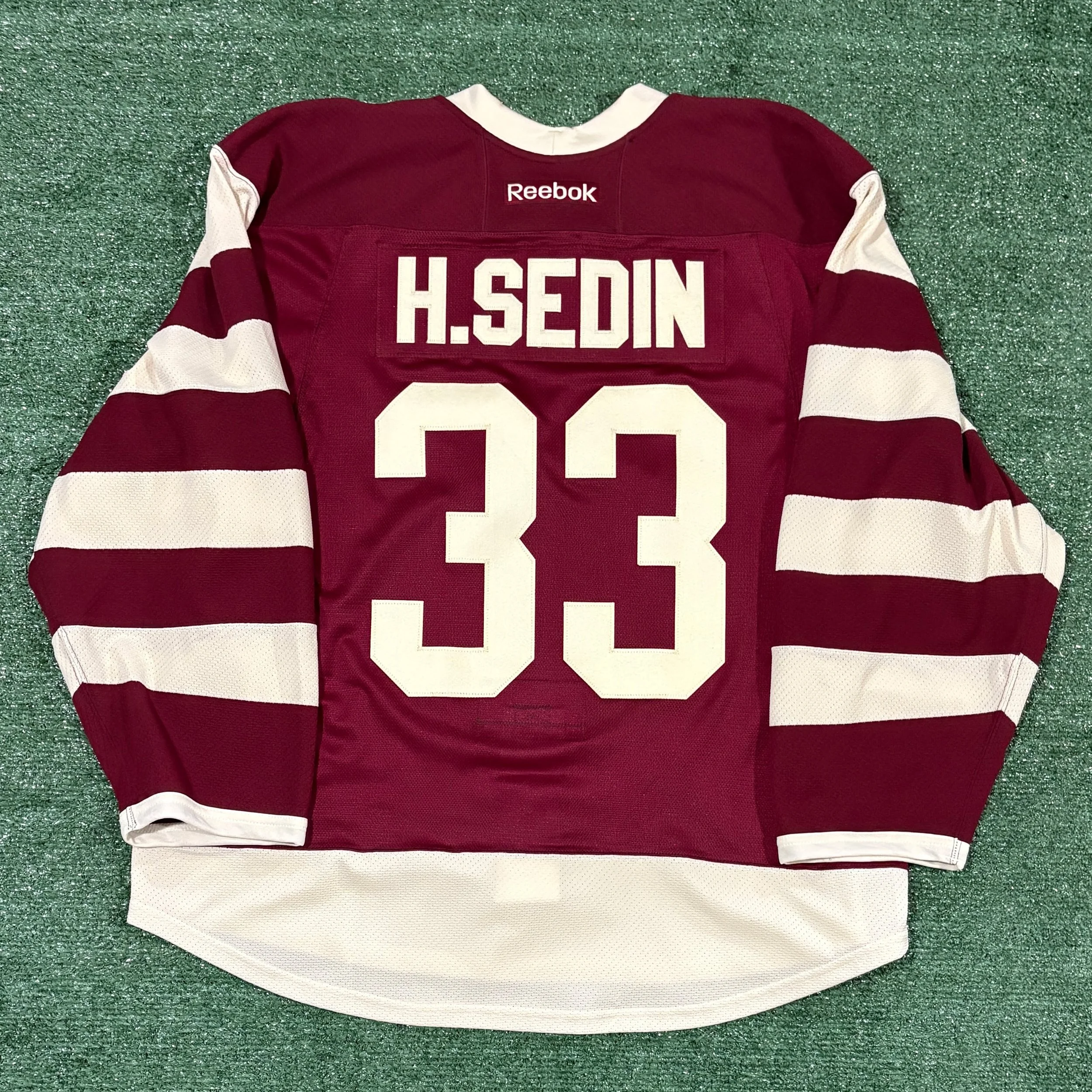 Henrik Sedin Canucks &ldquo;Millionaires&rdquo; Heritage Classic Jersey

Not often that I get to work on authentics from the Canadian teams, but when I do, it&rsquo;s always fun. This is no exception. One of the few jerseys in recent history not to u