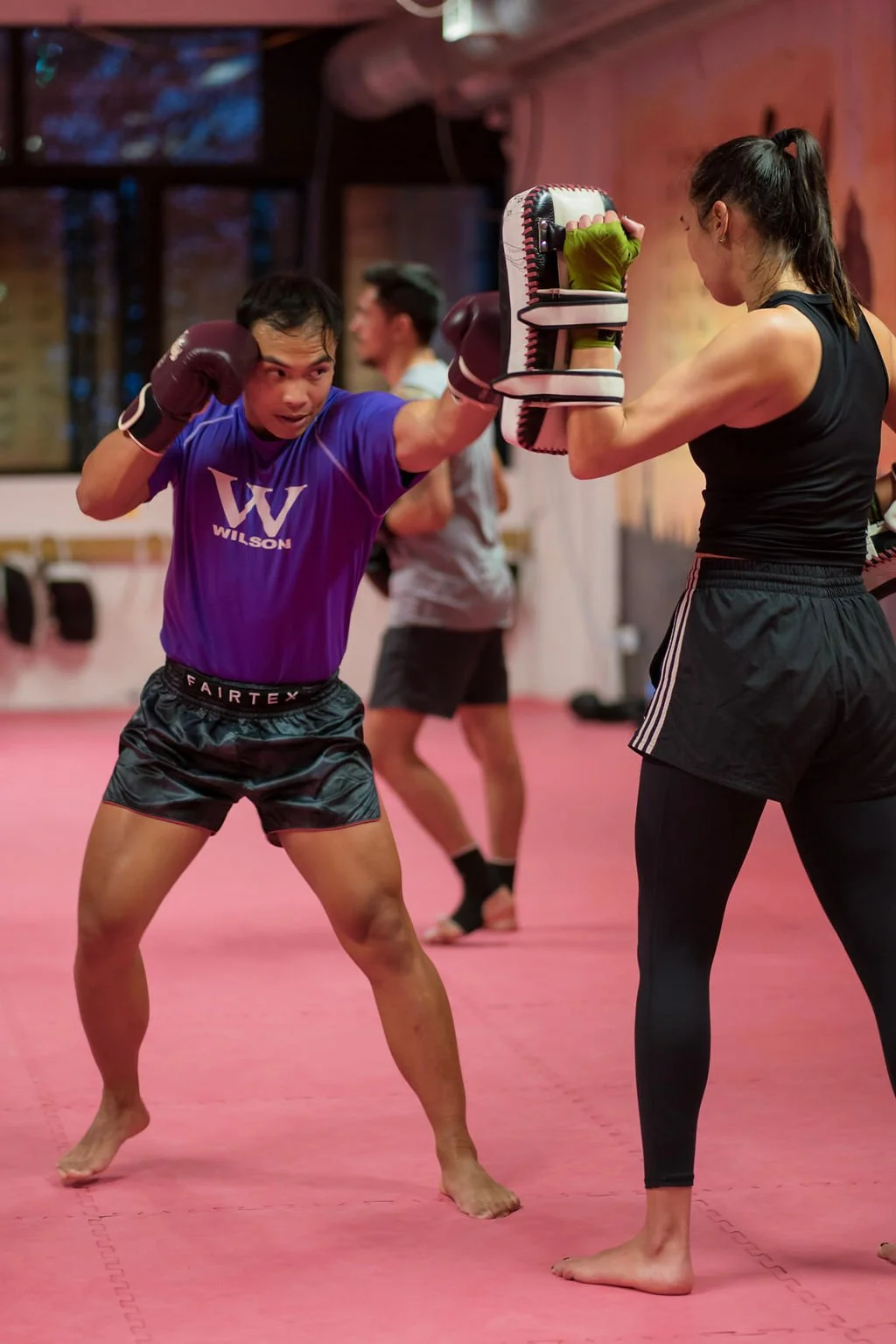 man throwing muay thai jab at jai thai boxing