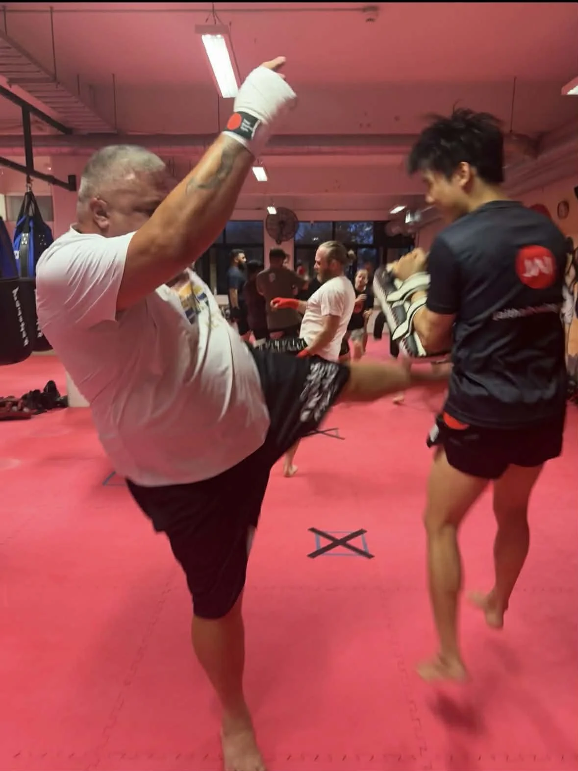 jeremy at 170kg taking muay thai class kicking