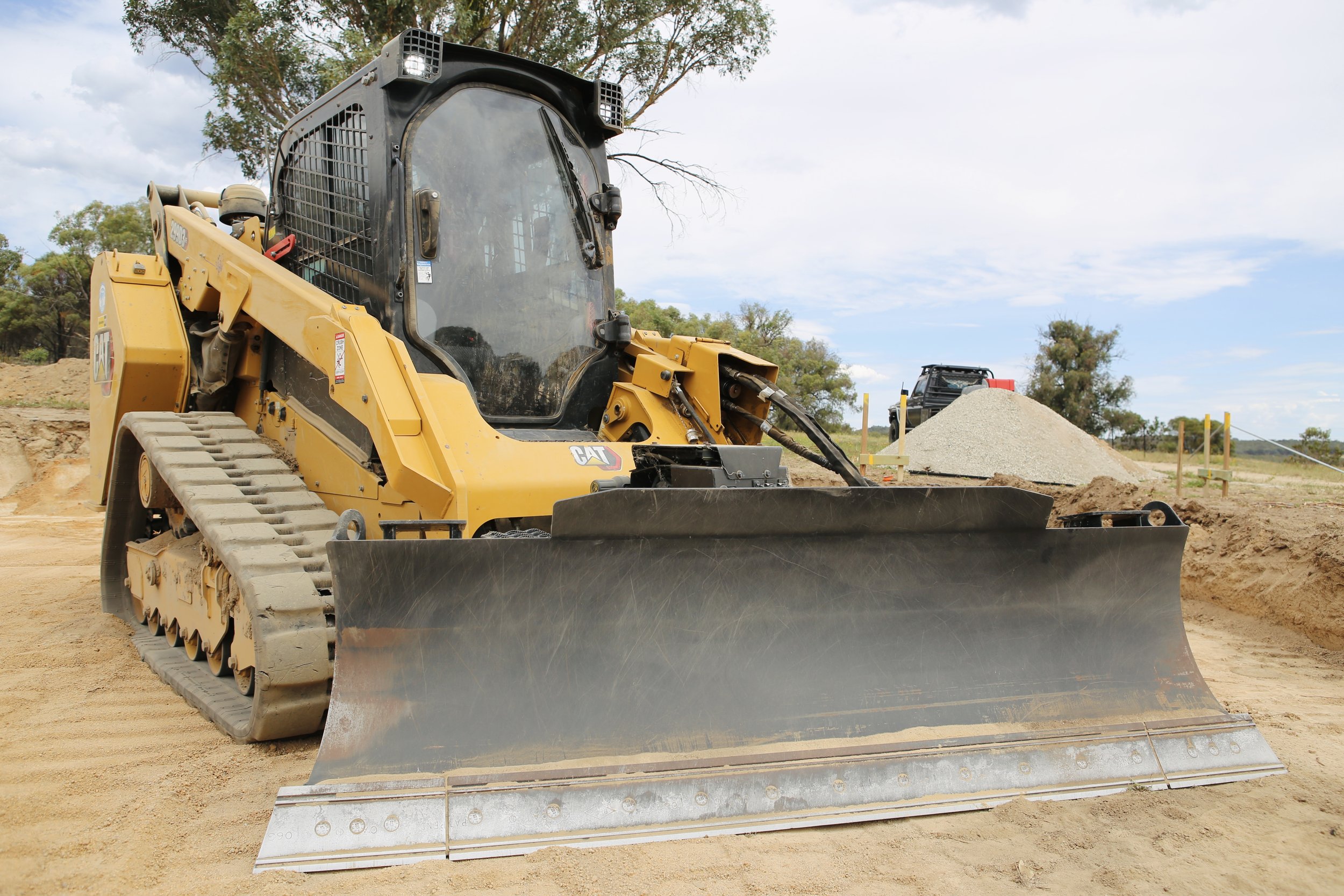 Dozer Blade: Designed for grading and shaping terrain.