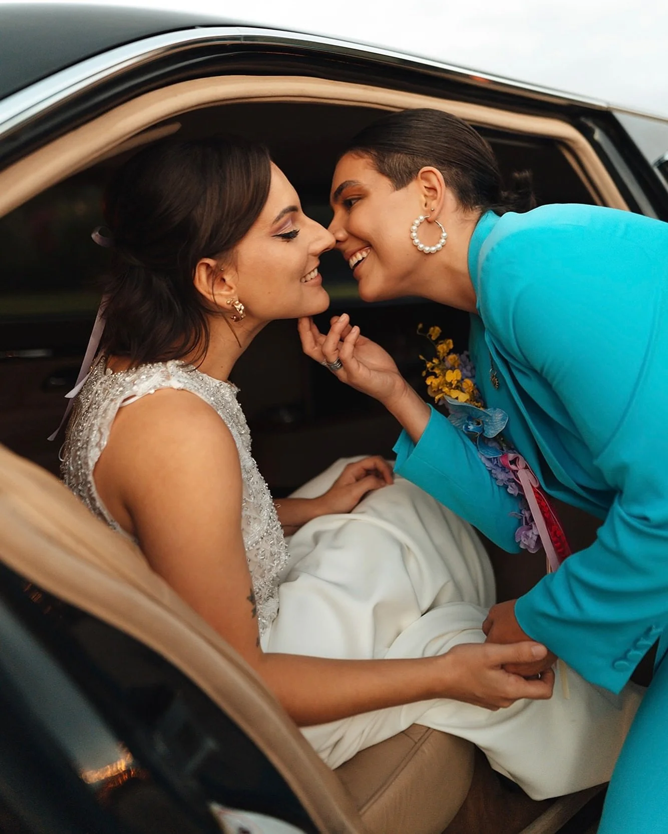 Two gals, madly in love, grinning like they just pulled off the heist of the century (spoiler: it&rsquo;s each other&rsquo;s hearts 💅). This is what a damn good wedding day looks like. If you&rsquo;re into big laughs, real moments, and photos that f