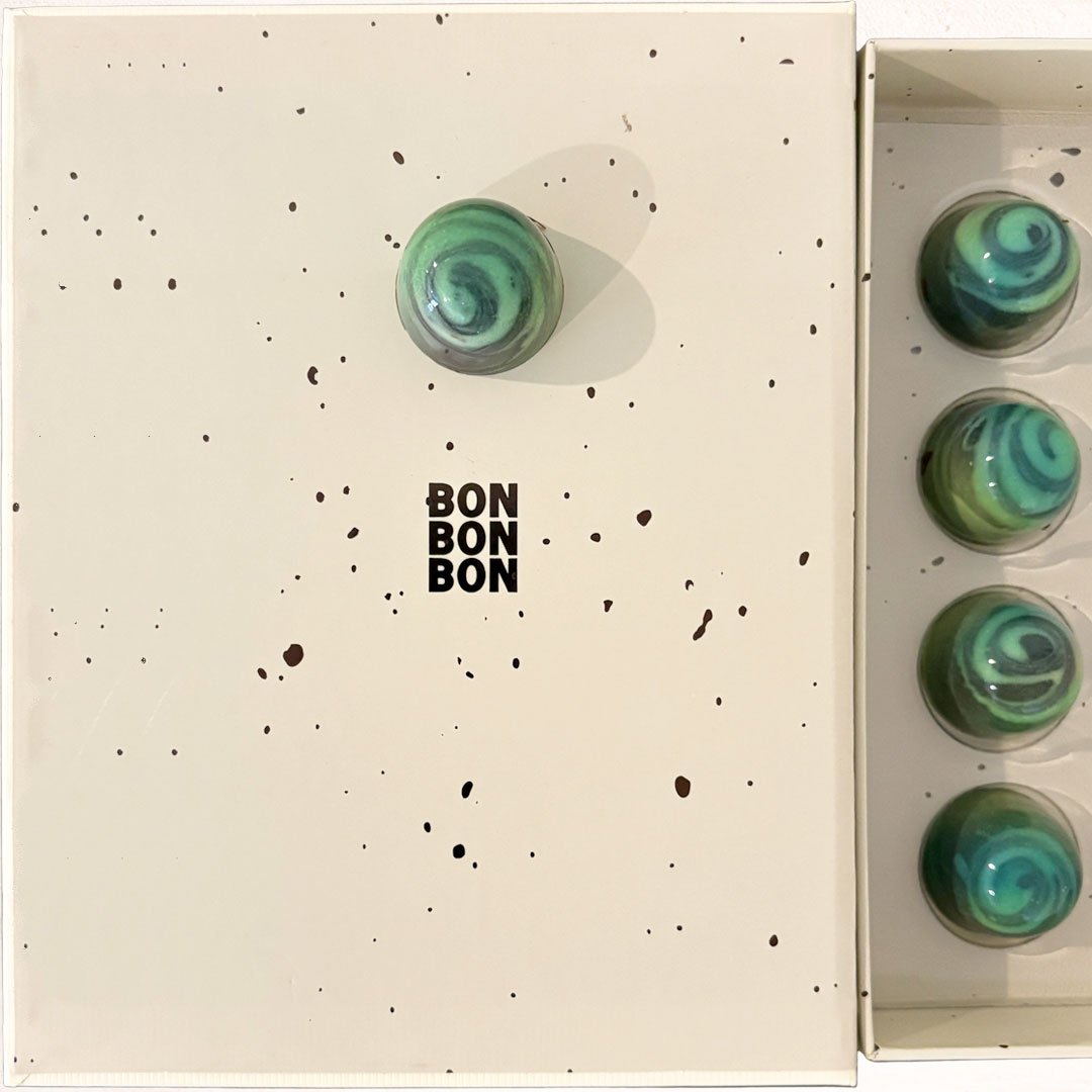 BONBON OF THE MONTH

Summer, captured in a bonbon.

This is the Mojito Bonbon &mdash; Mint. Lime. Rum. Chocolate. Yum.

Contains alcohol.
Limited release.

#bonbonbon #bonbonbonchocolatier #eastfremantle #perthchocolatier #madeinperth #artisanbonbon 