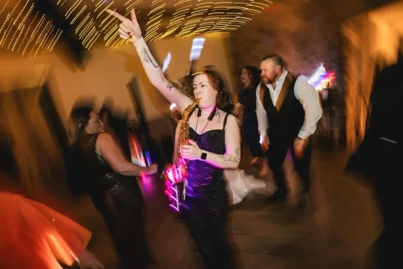 Always bringing the vibe 🎷✨
&bull;
&bull;
&bull;
#sax #saxophone #wedding #party #energy weddingparty saxplayer femalemusician 
@the_neutral_nestx @strettonmanorbarn
