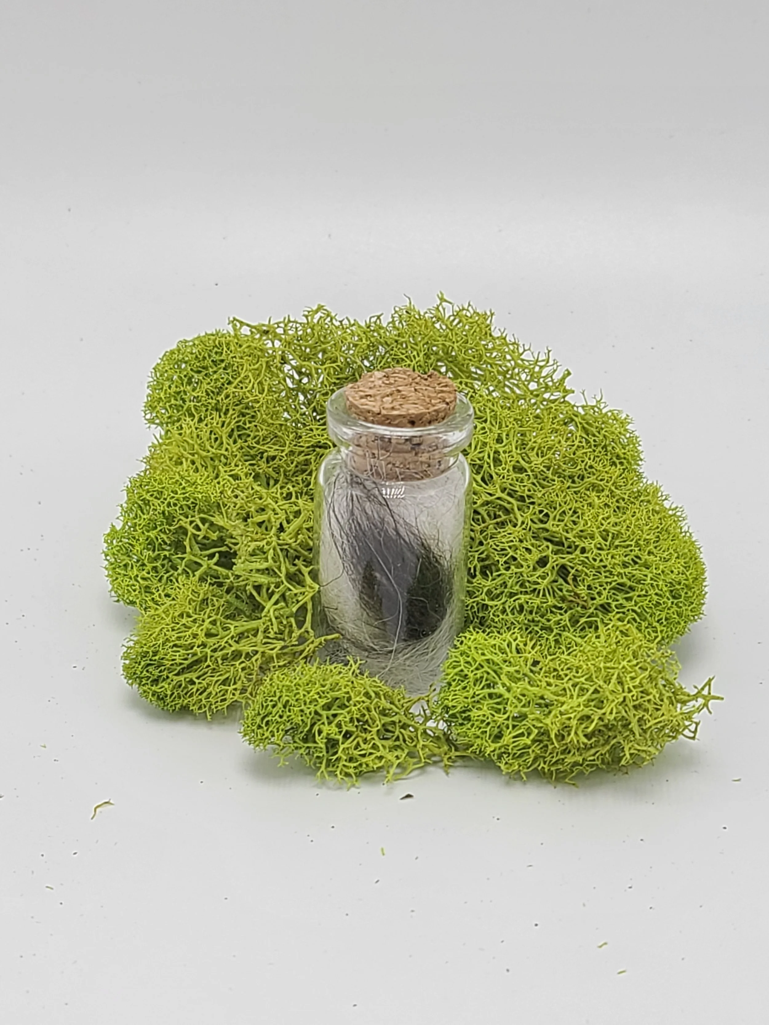 Fur/Feather Clipping in corked glass vial
