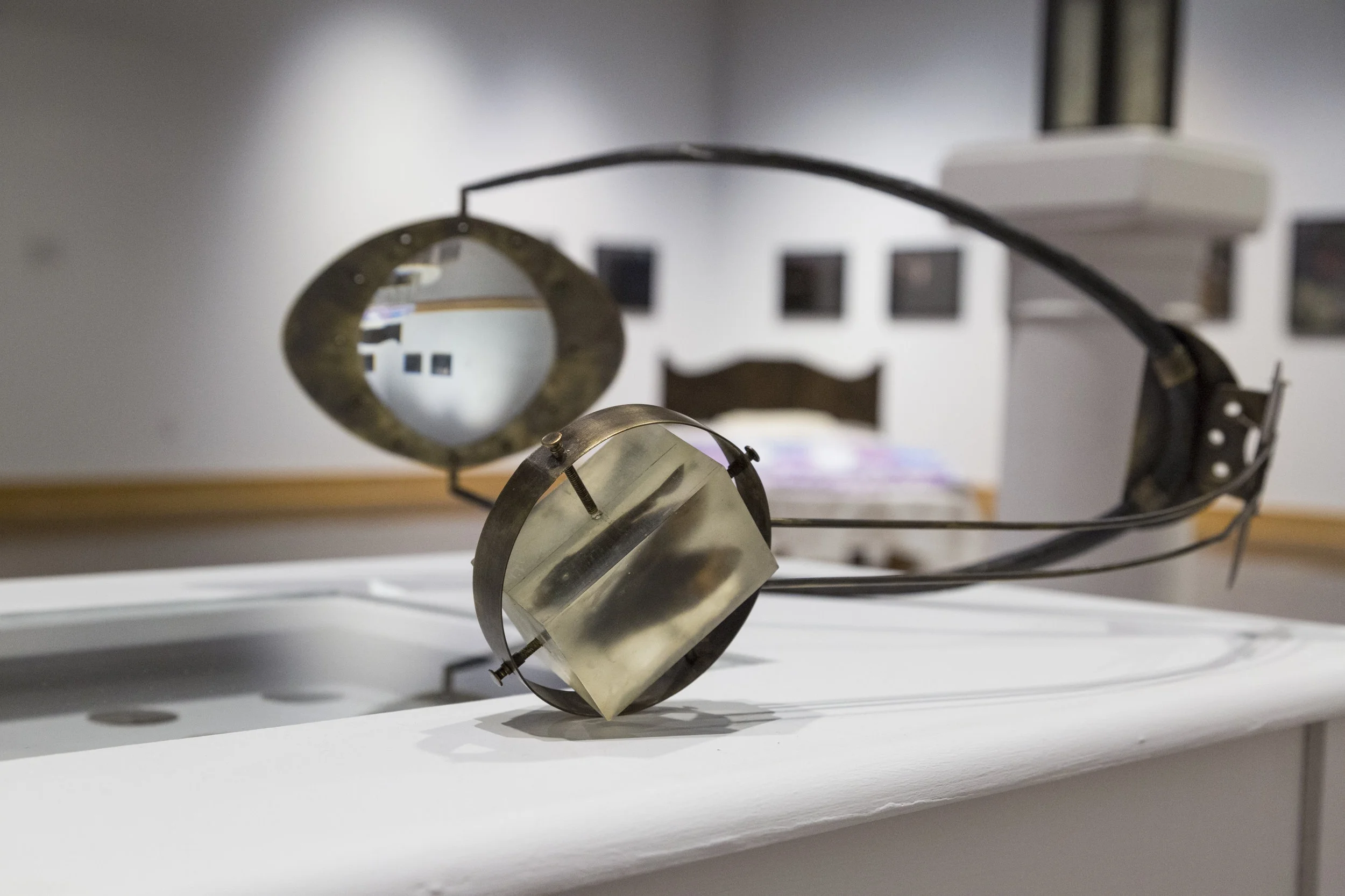 John Muehl,&nbsp;Aggressive Observation,&nbsp;2016, Brass, glass, forged steel, resin, moth specimen. 2016 School of Art and Design BFA Thesis Exhibition.