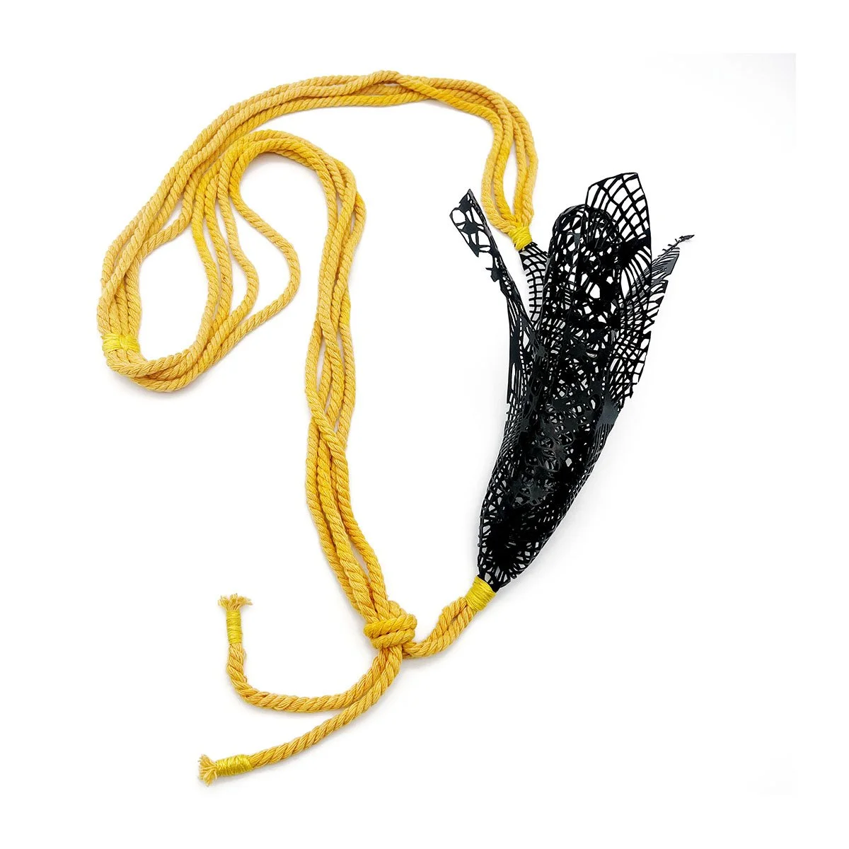   April Wood,   Banana  (necklace), mild steel, dyed cotton cord, thread, 18 x 8 x 3.5 in. Photo Credit: Artist.  