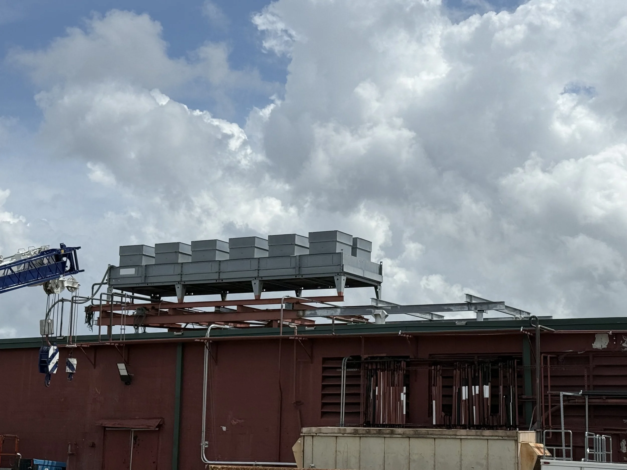 Structural steel fabrication and installation for condenser expansion project.  Completed while in service with no interruptions.
