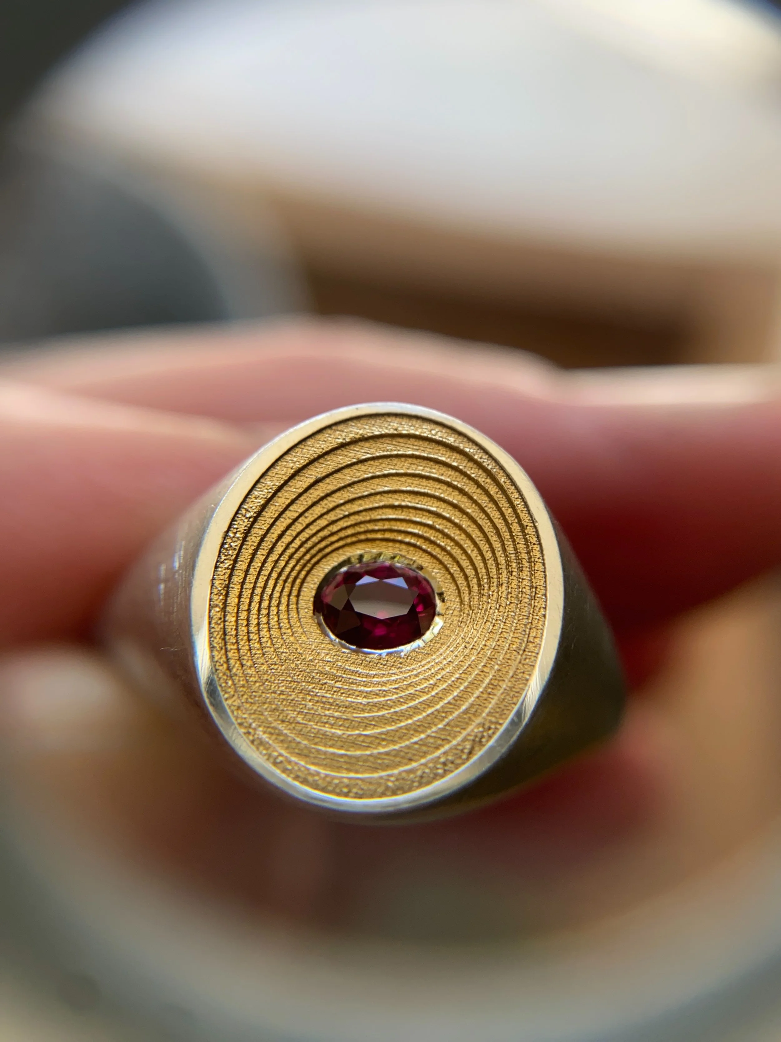 A special bespoke version of the Spiral signet ring for a big 40th birthday! 

Commissioned by the birthday girl&rsquo;s family. We worked together on the details and I hand-picked this beautiful deep ruby for the centre which contrasts SO well with 
