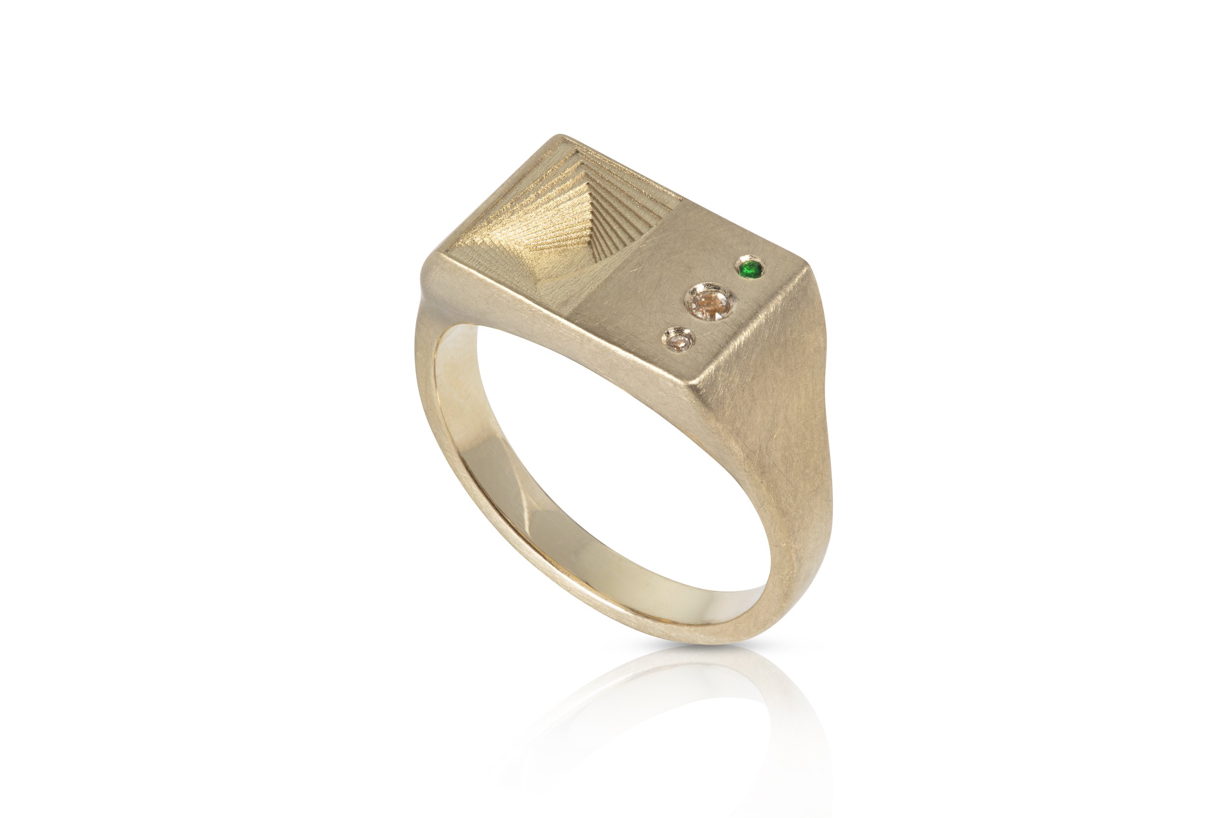 A 9ct gold ring with rectangular top featuring three embedded gemstones (green and clear) on a white background.