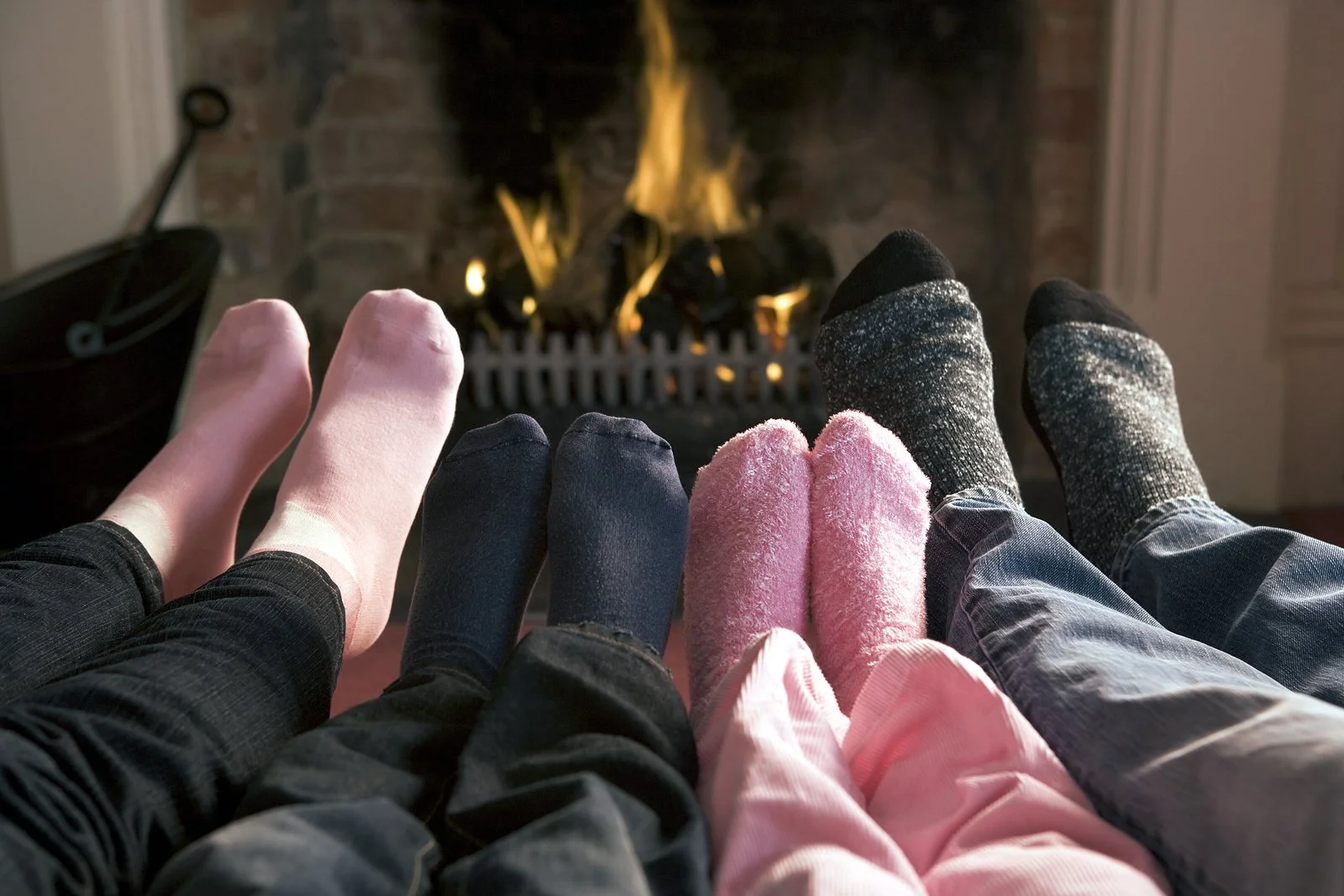 bigstock_Families_Of_Feet_Warming_At_A__4135281.jpg