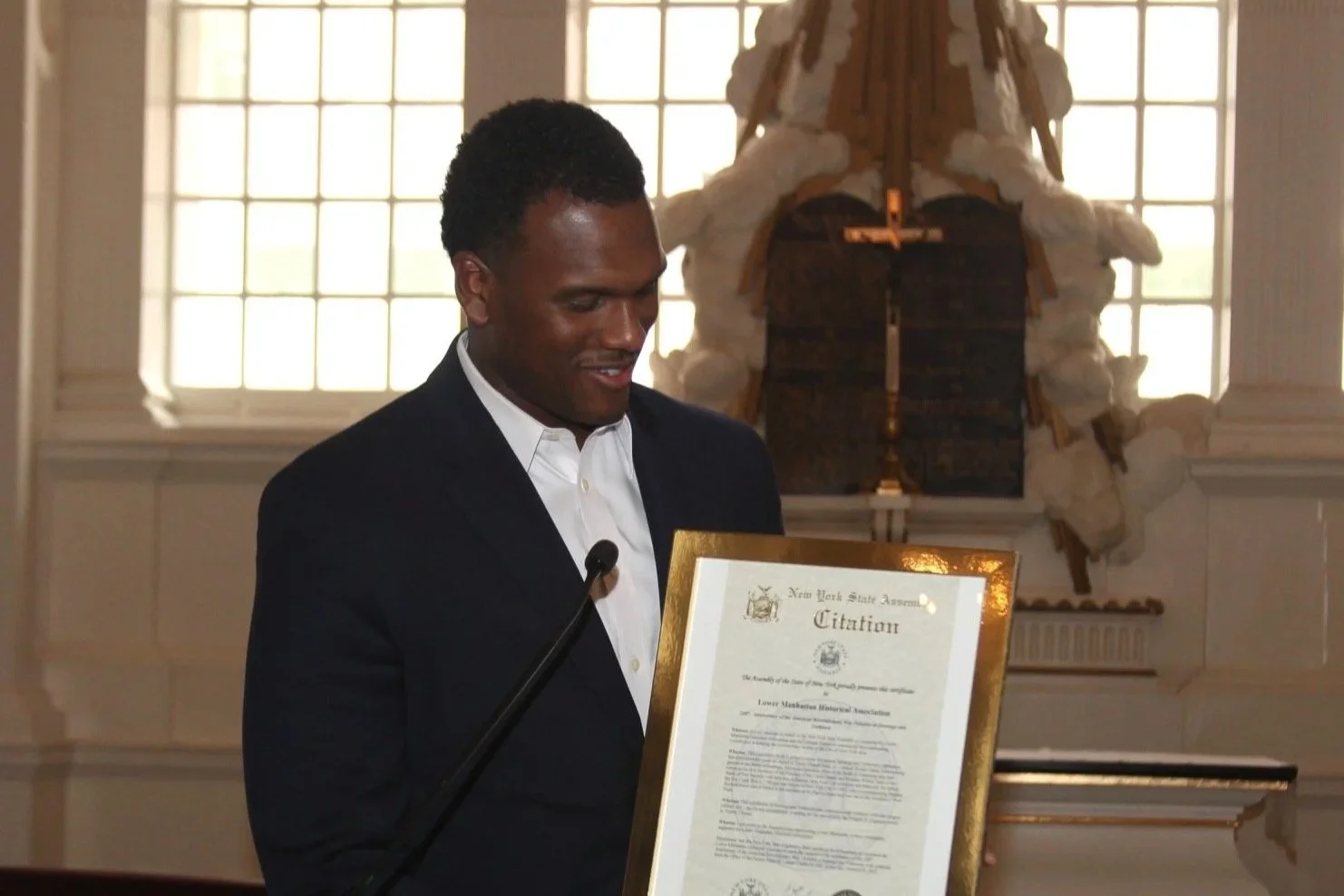 Charles Fall presenting the Citation