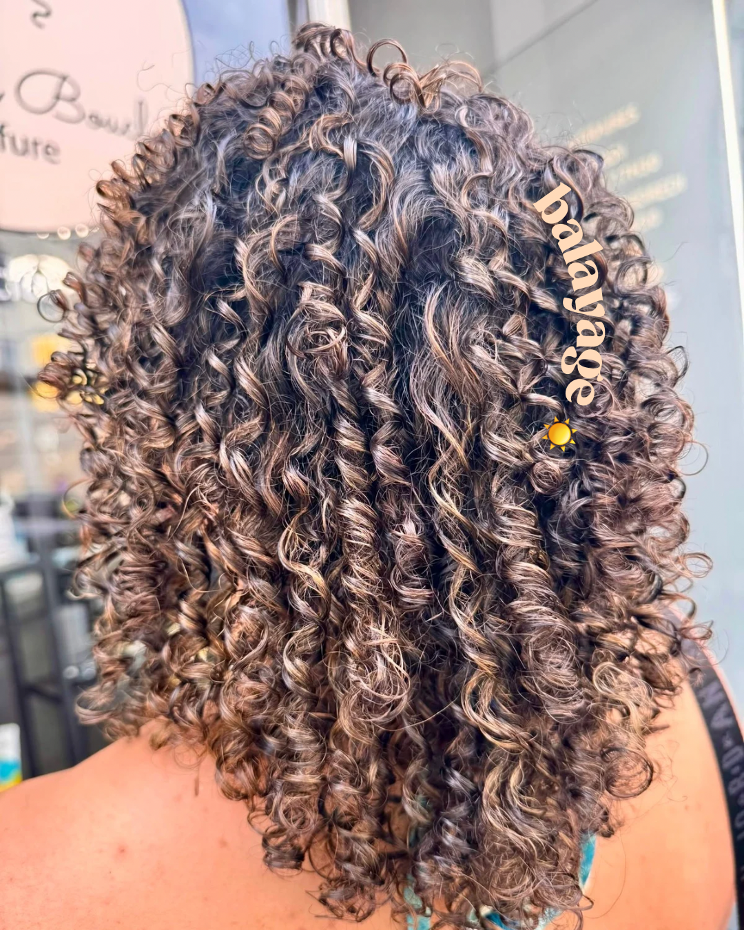 balayage cheveux bouclés