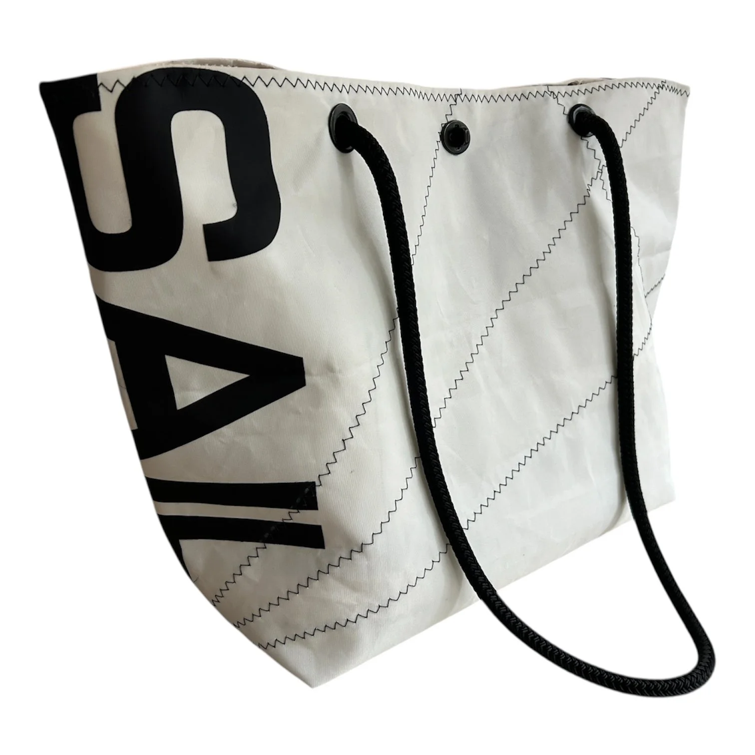 White tote bag with black text and black drawstrings.