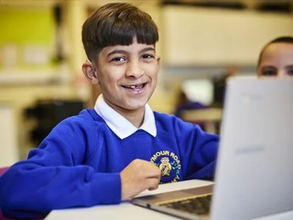Pupil working on a laptop