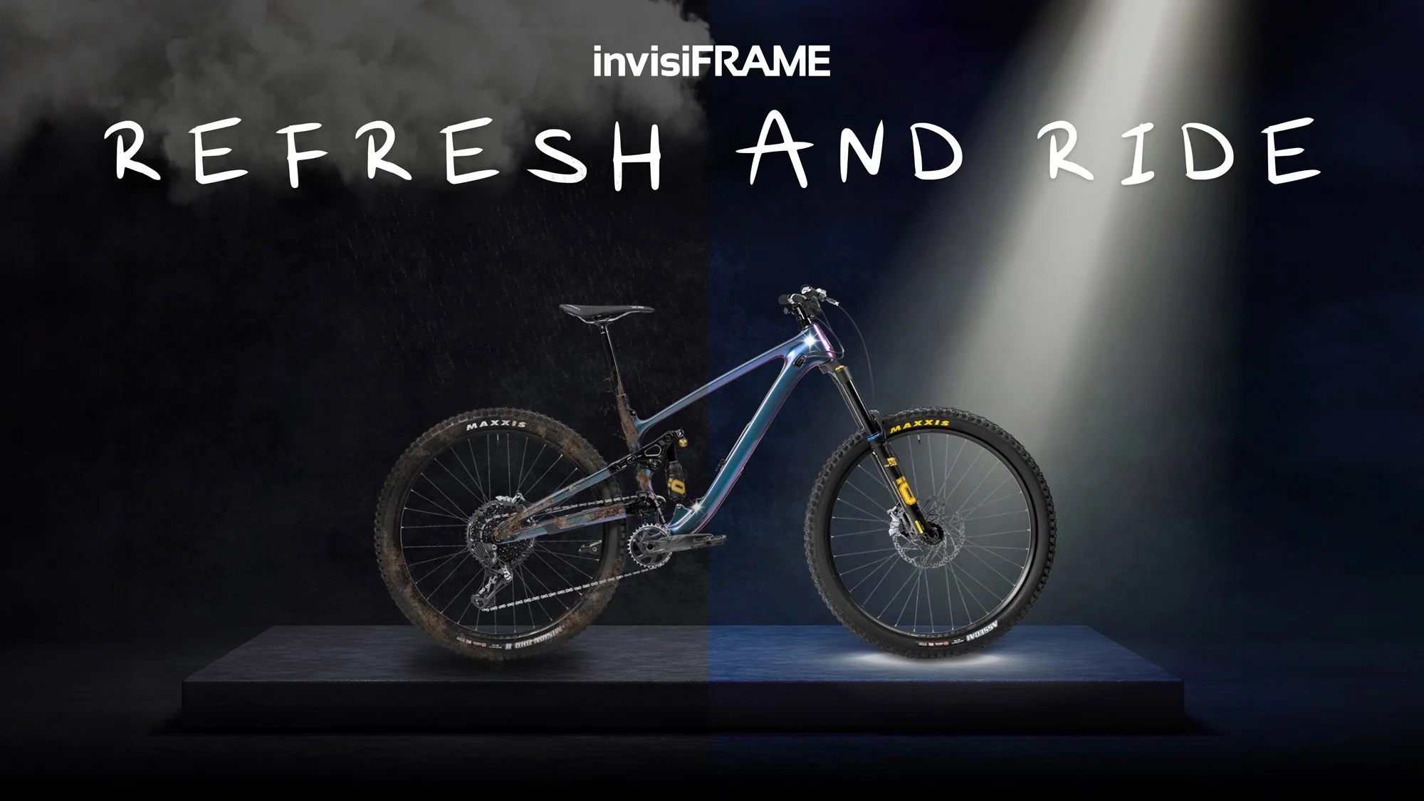 Mountain bike half muddy and half clean, staged on a platform with the words 'Refresh and Ride', invisiFRAME logo above.