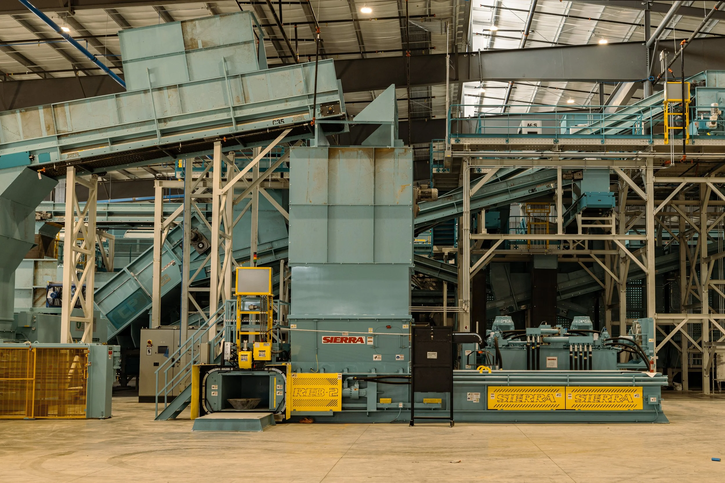 Office lobby with Balcones Recycling sign and modern décor