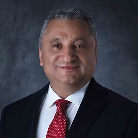 A photo of President Dr. Ercan Aydogdu.