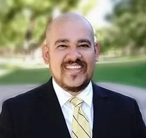 A photo of Gil Lopez.