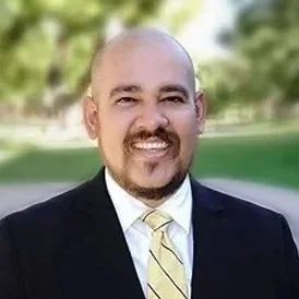 A photo of Gil Lopez.