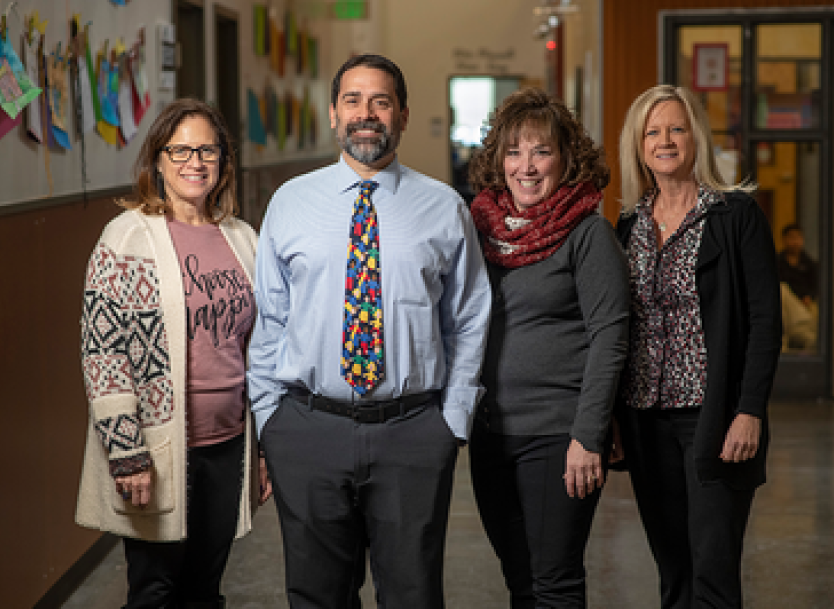 A photo of a group of teachers.