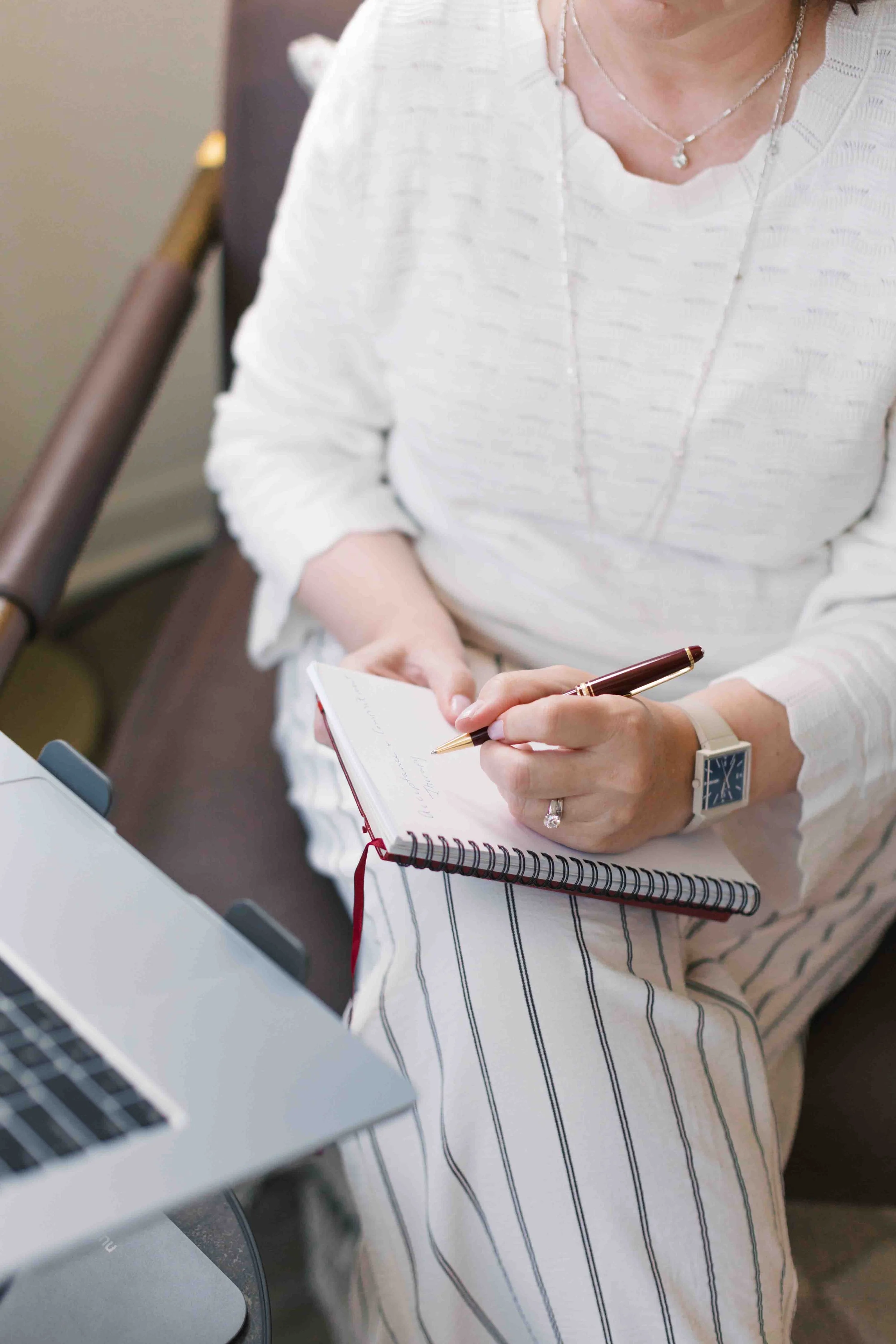 Nichole Alspaugh Williams therapist taking notes in a notebook