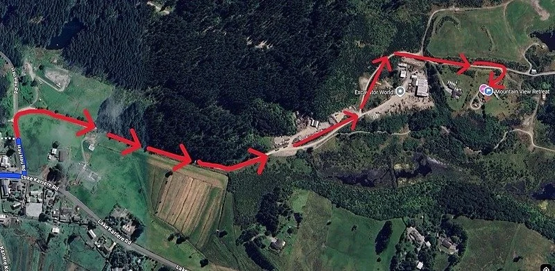 Satellite route along the unsealed road past Excavator World