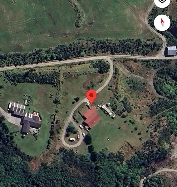 Aerial view showing Mountain View Retreat at the end of the driveway