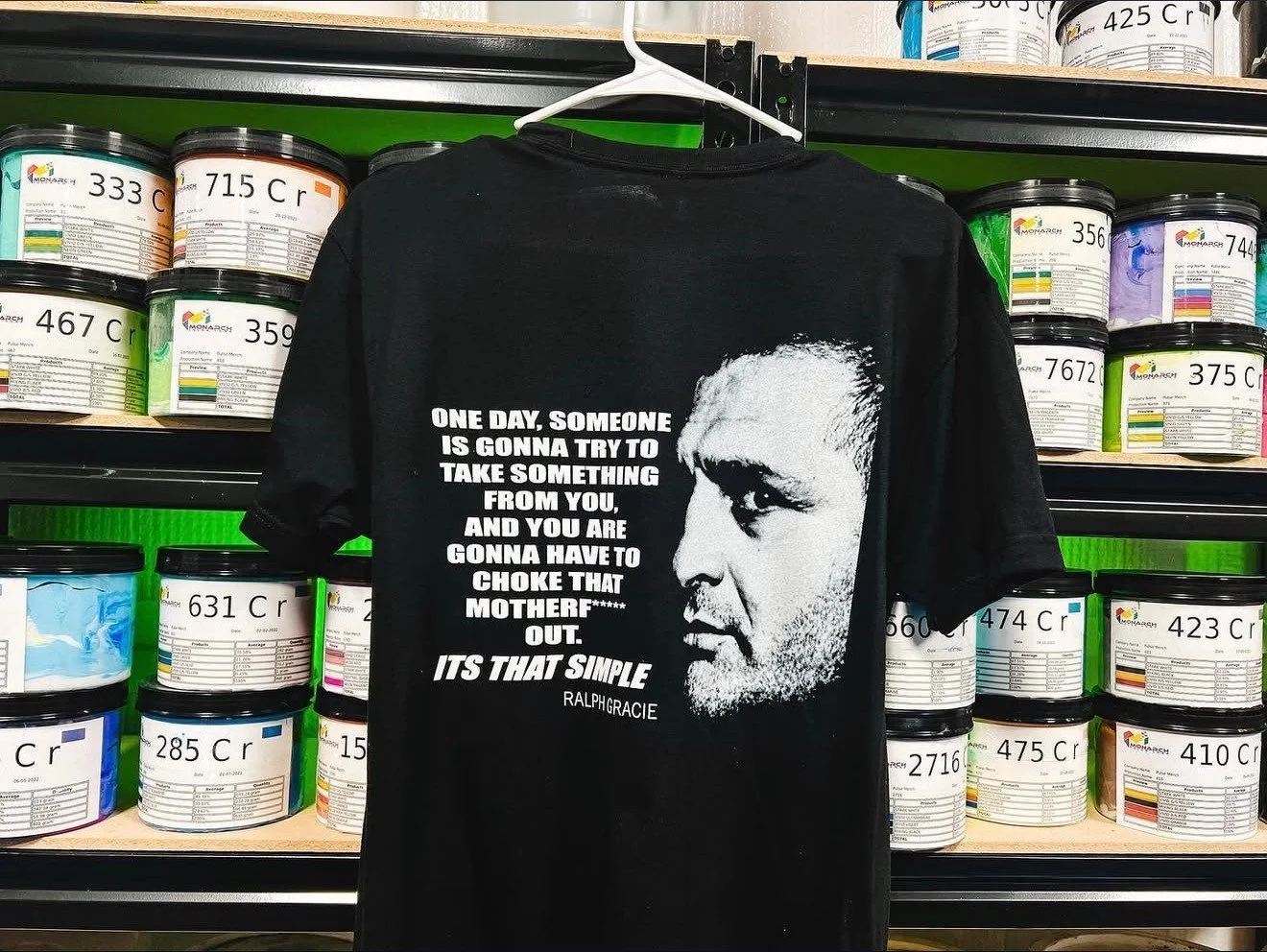 Every detail, every print, every story. 
Ever wonder how a simple black tee turns into something that turns heads (and sparks conversations)? It’s not just ink and fabric—it’s hours of dialing in artwork, color-matching, and hands-