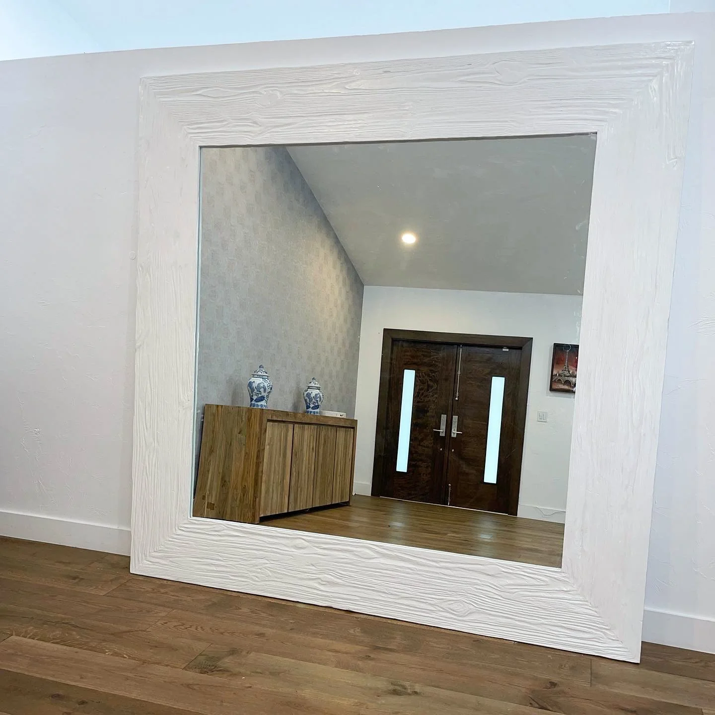 Hand carved and distressed Pine wood mirror frame.  Frame is 96" x 96" in total.