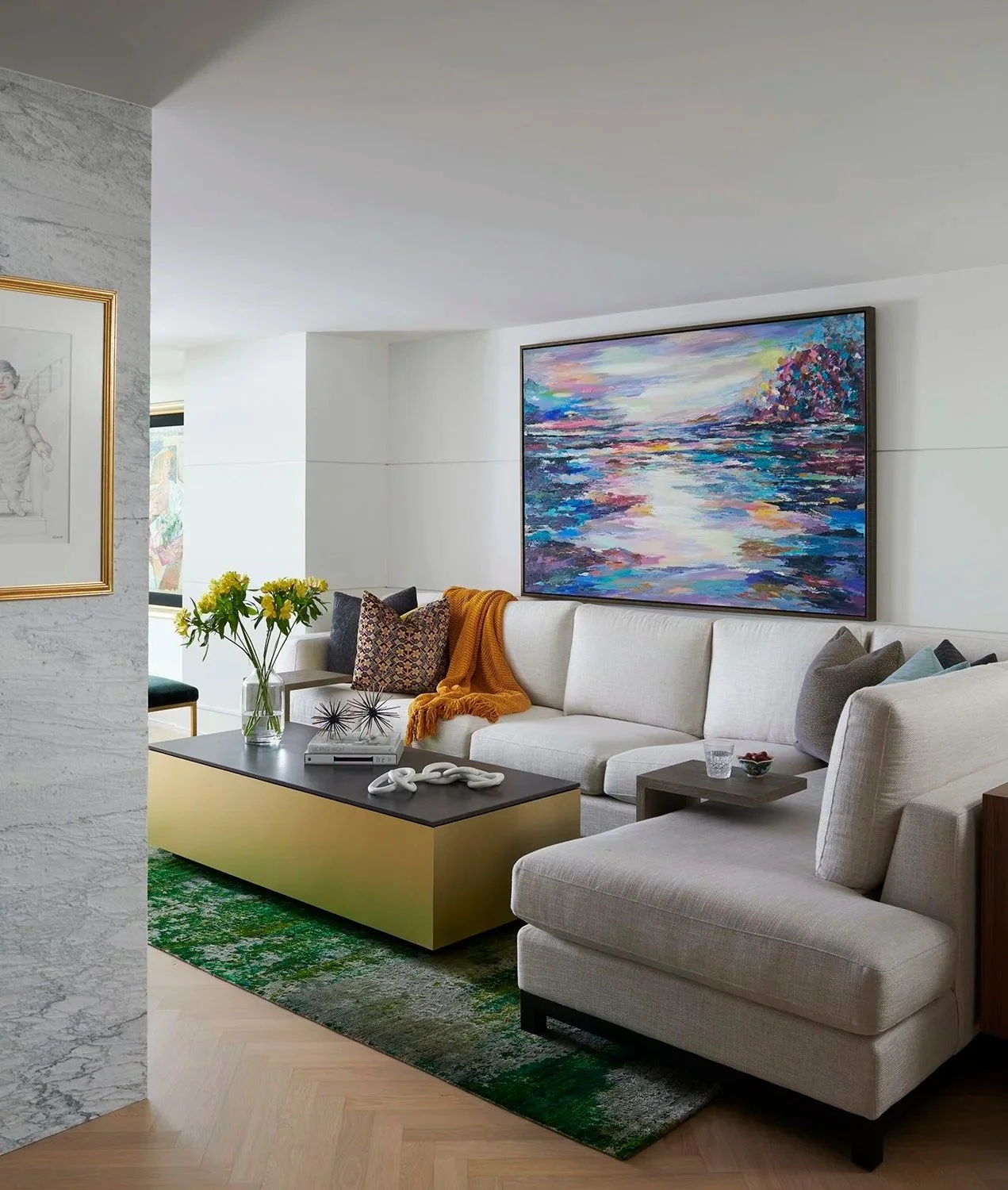 living room + sectional sofa + green rug + abstract art + yorkville toronto