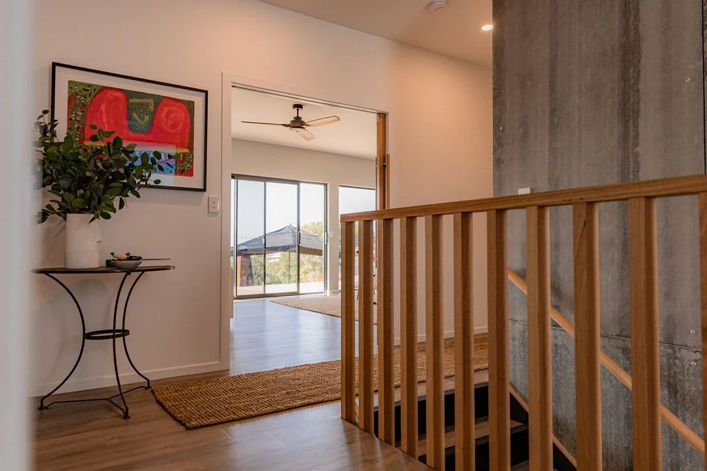 Terrace at Cooinda on the beach with coastal scenery in background.