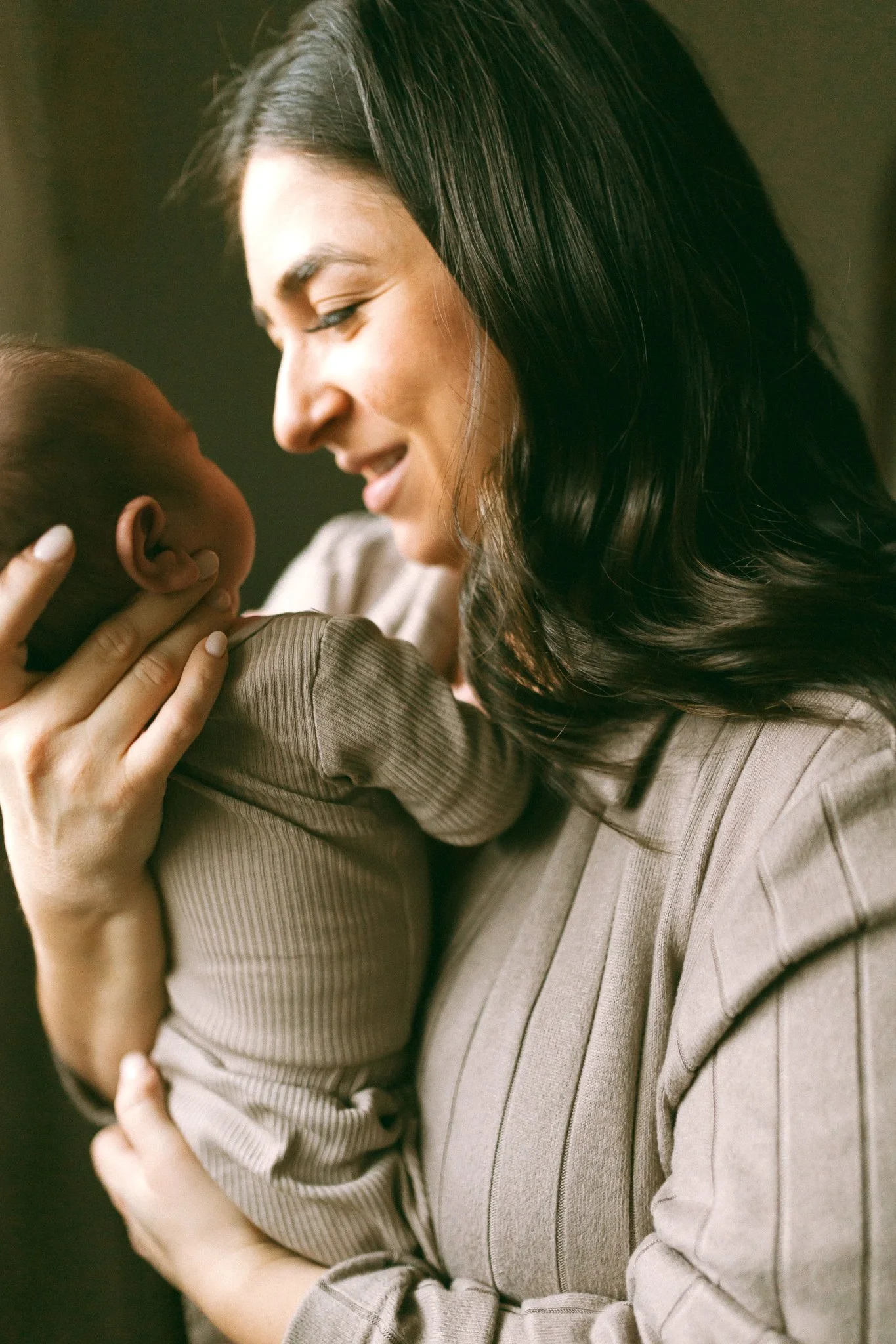 Close-Up of Mother Holding Newborn