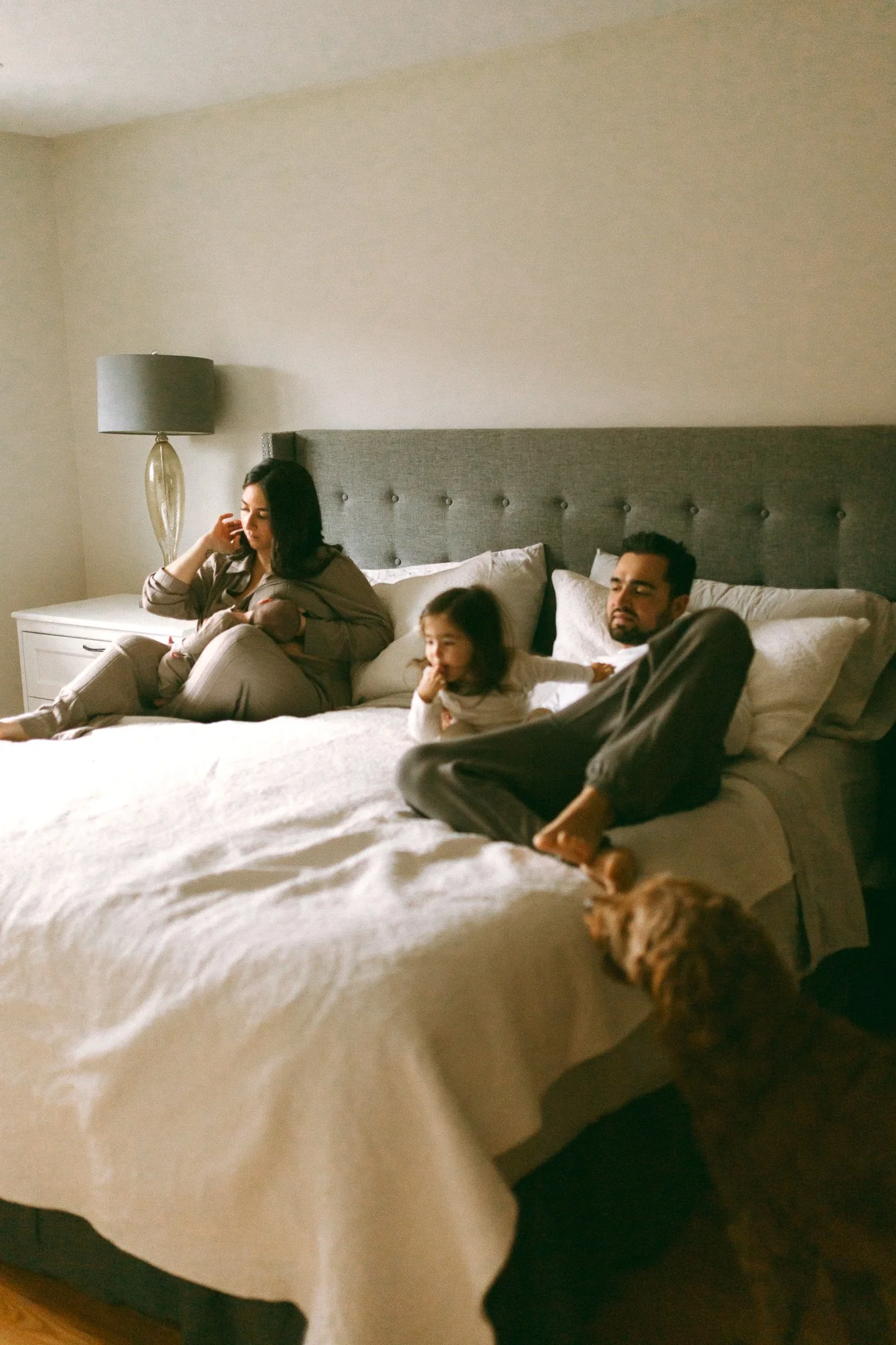  Family Relaxing Together on the Bed