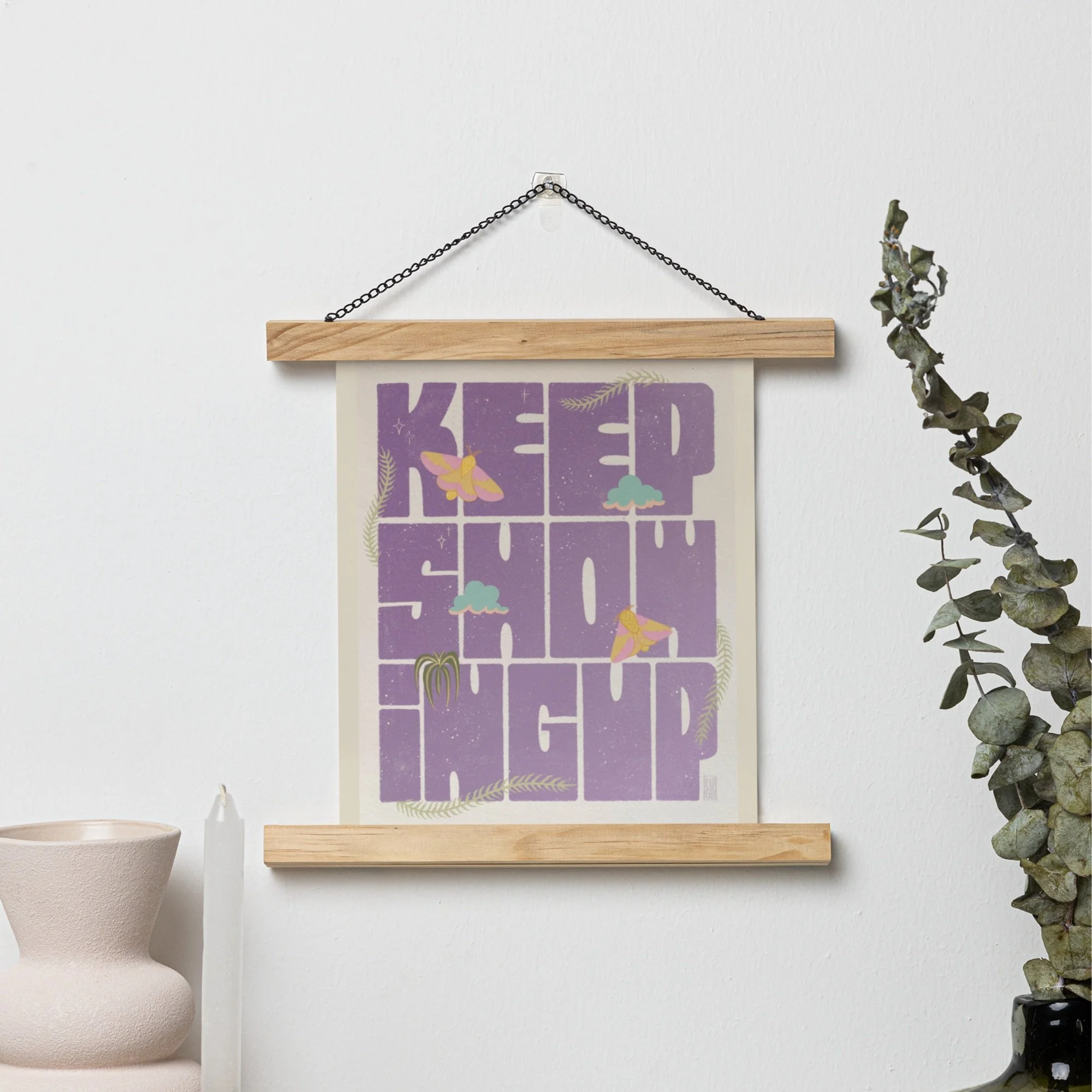 mockup-of-a-matte-vertical-poster-hanging-on-a-wall-featuring-modern-decorations-m35725 copy.jpg