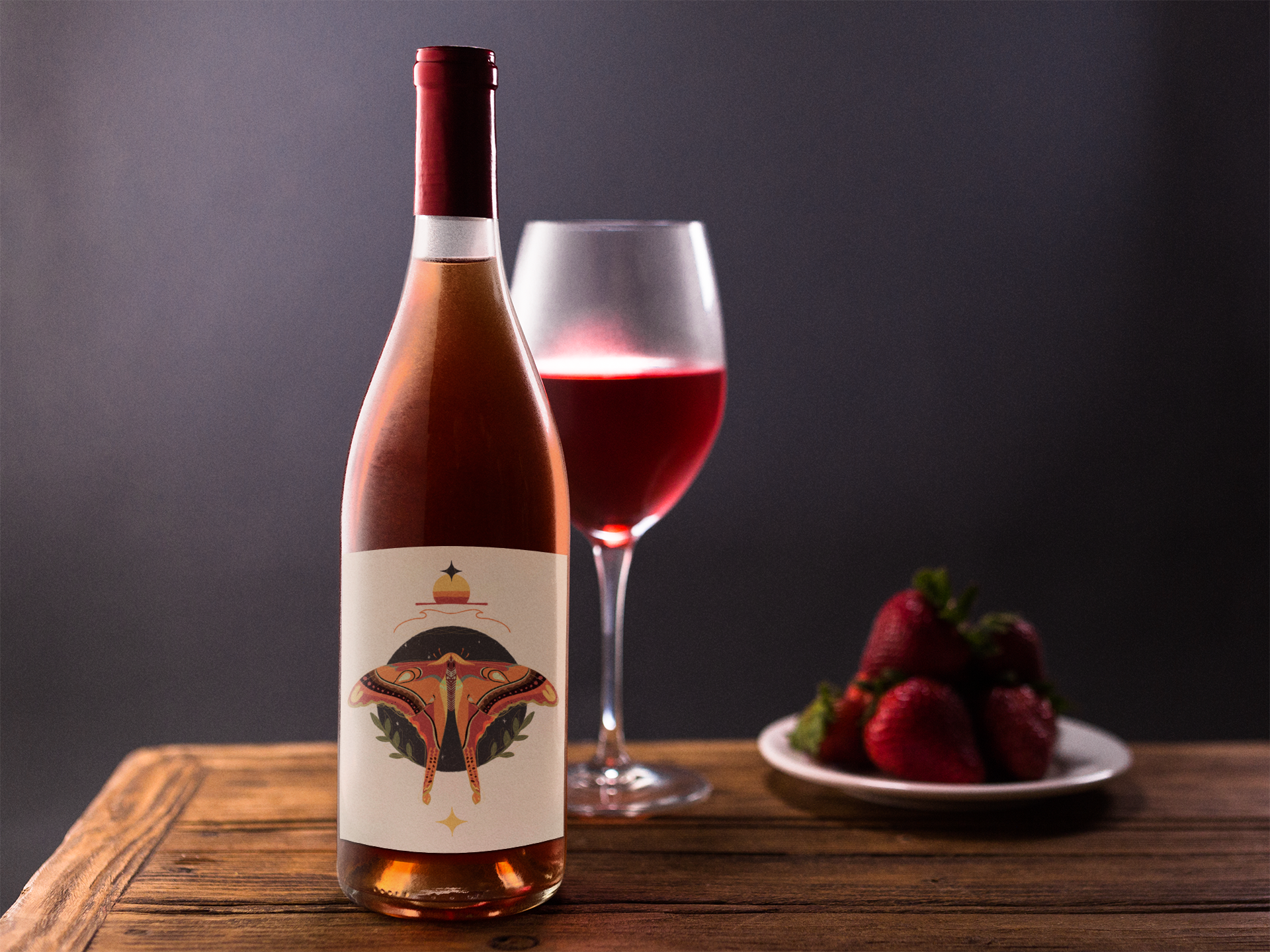 rose-wine-bottle-template-with-a-served-glass-and-strawberries-on-a-wooden-table-a14683.png