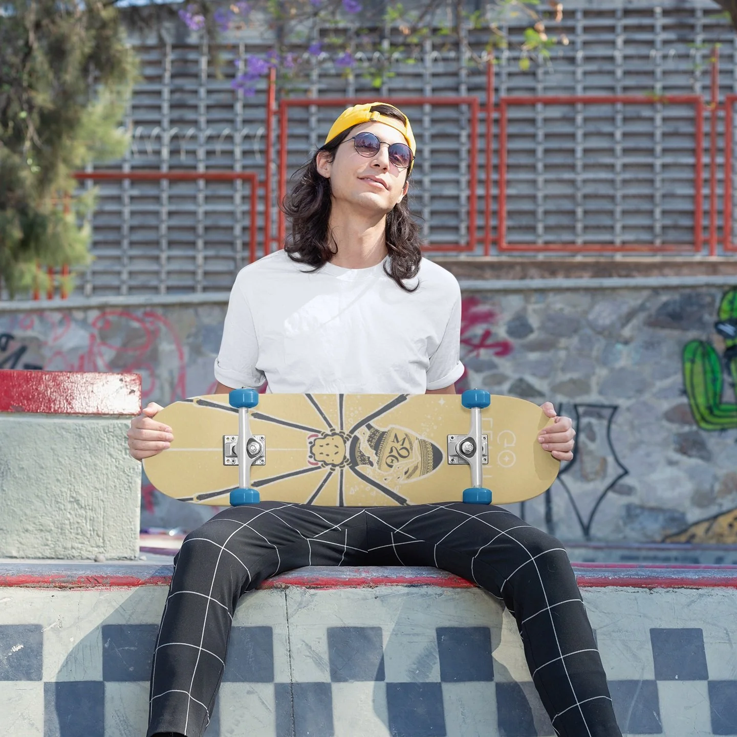 skateboard-mockup-featuring-a-young-man-sitting-on-top-of-a-skate-ramp-27195.jpg