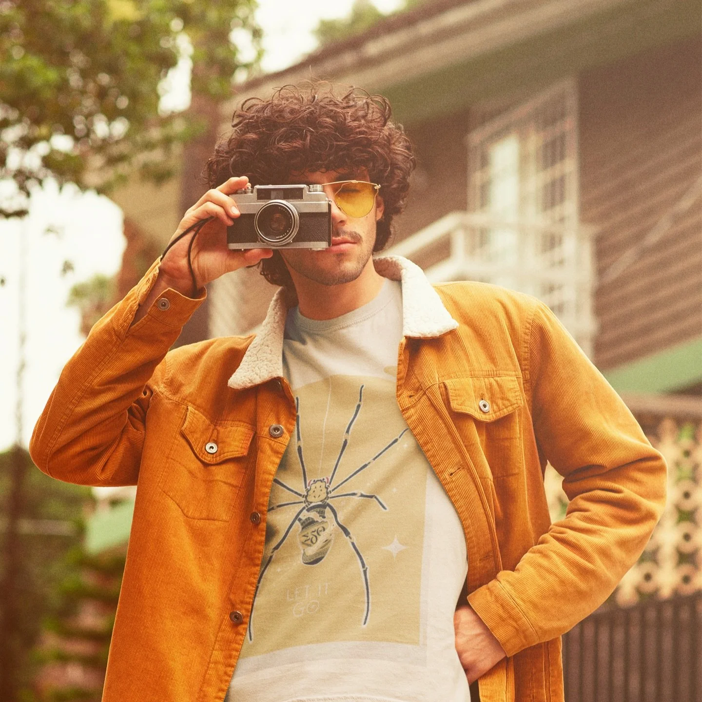retro-mockup-of-a-curly-haired-photographer-wearing-a-t-shirt-m10120 copy.jpg