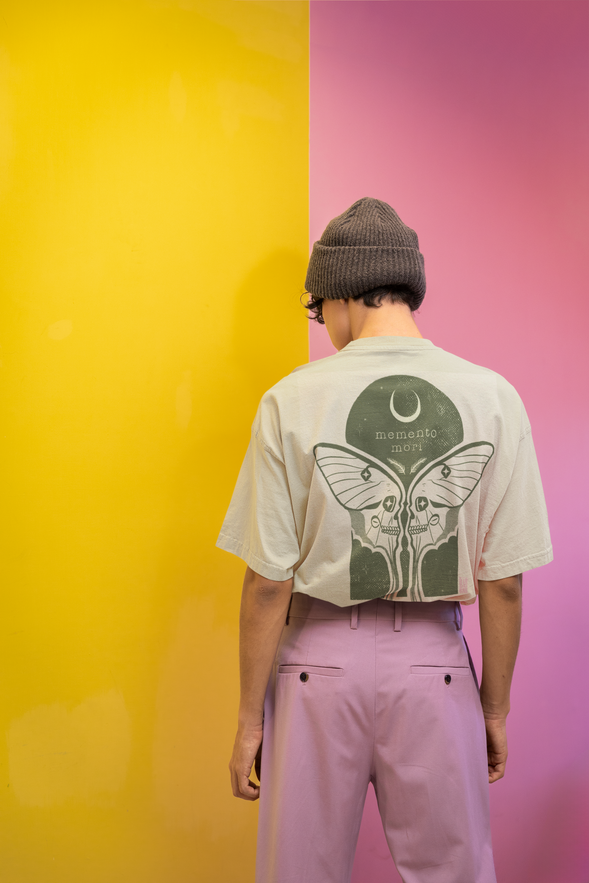 back-view-mockup-featuring-a-man-wearing-an-oversized-tee-in-a-new-pop-wave-inspired-aesthetic-m38765.png