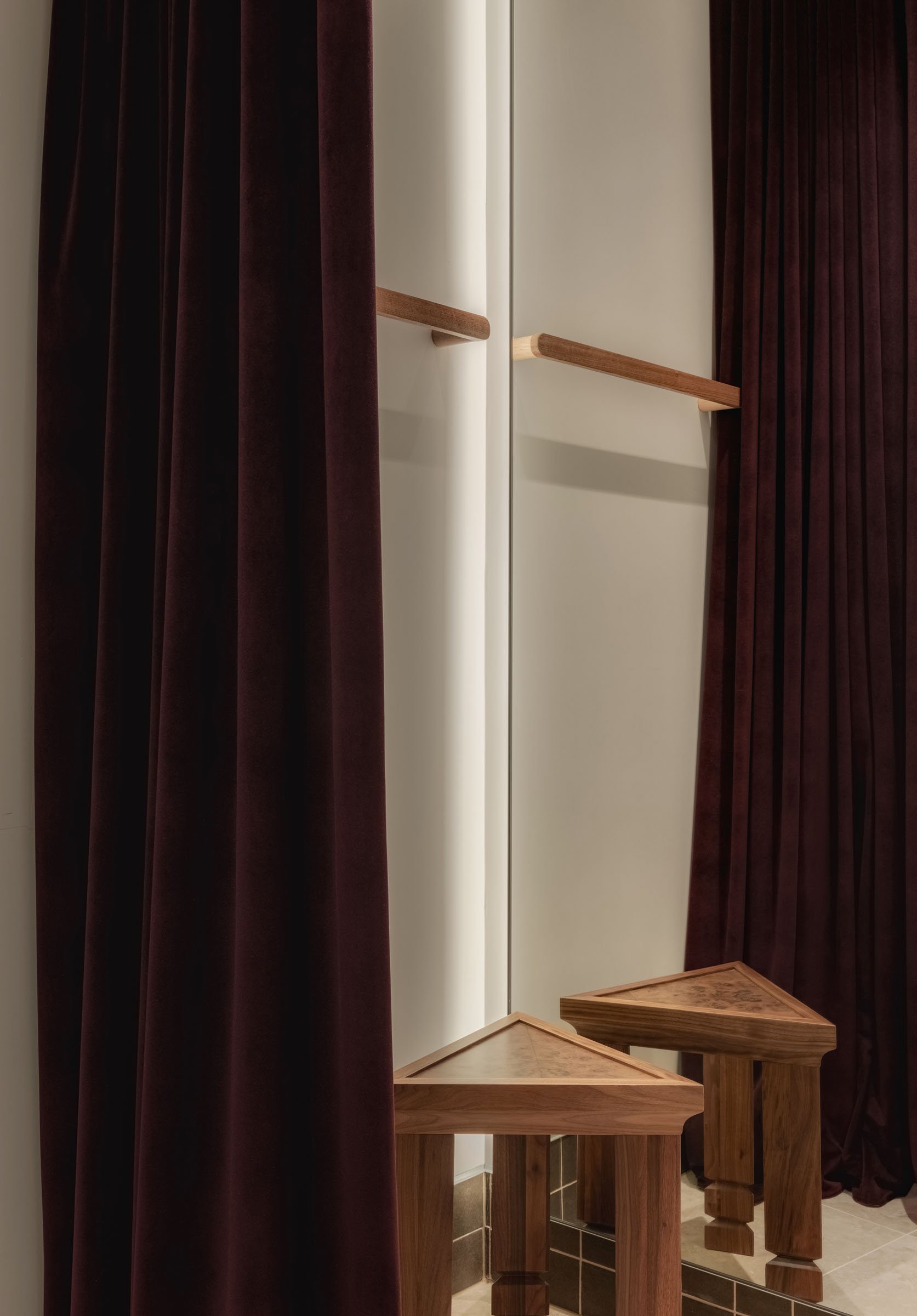 Sabo Sunshine Plaza fitting room interior featuring rich fabric curtains, timber detailing and an intimate boutique customer experience.