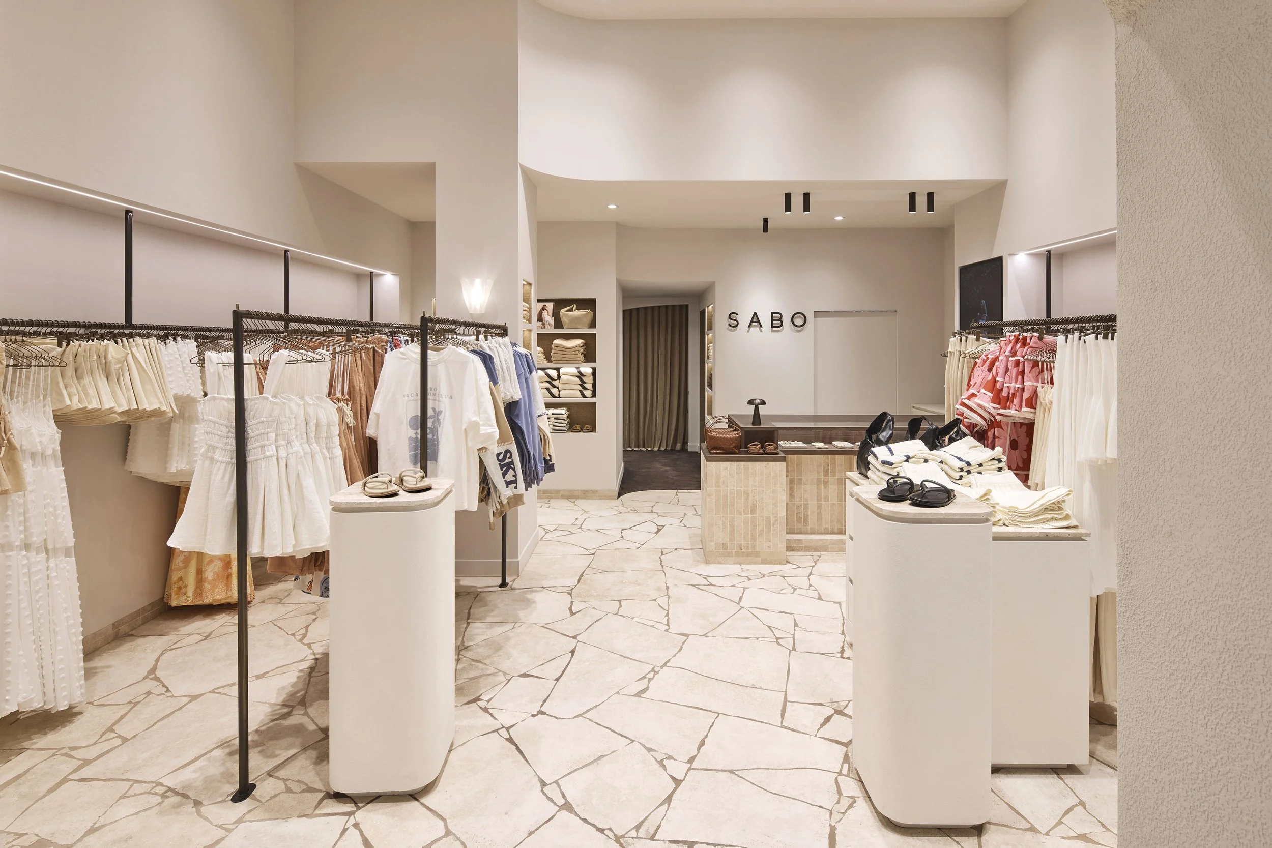 contemporary retail interior with cream finishes and refined minimal detailing