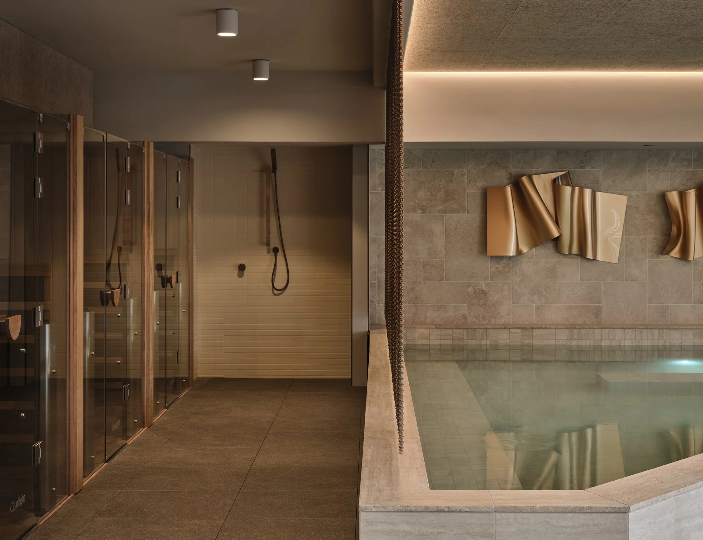 Wellness interior design by Collectivus featuring hydrotherapy pool, sauna and premium recovery facilities at Total Fusion Docklands in Melbourne.