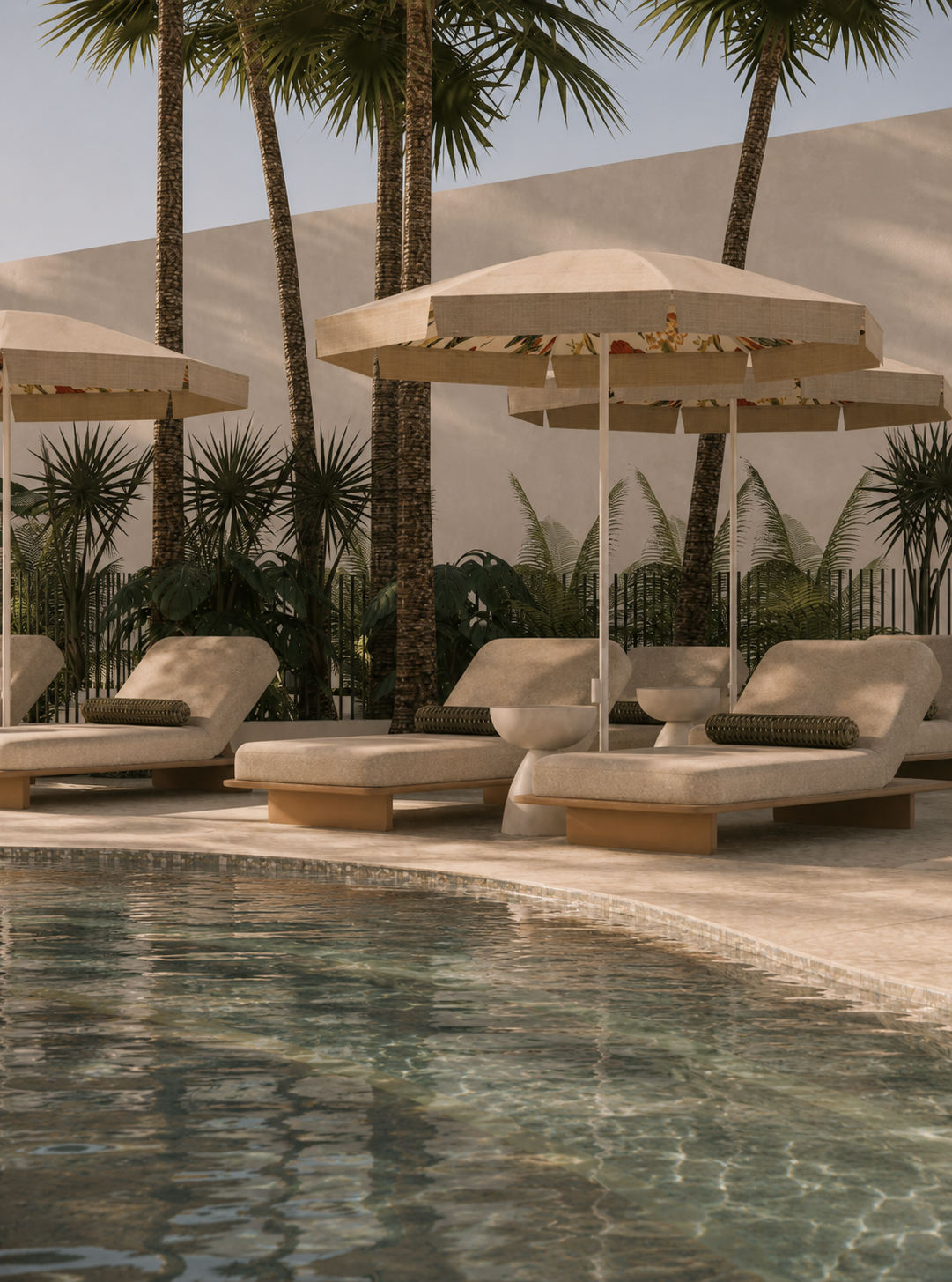 Poolside daybeds and tropical landscaping at The Leea hotel in Darwin