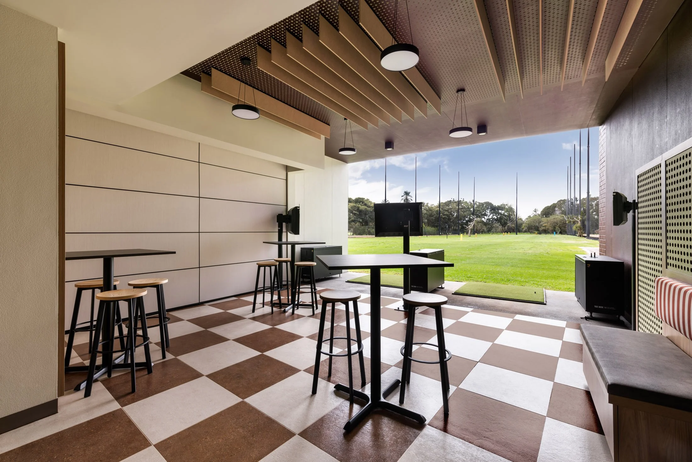 Whaleback Golf Course driving range entertainment bays overlooking the golf course