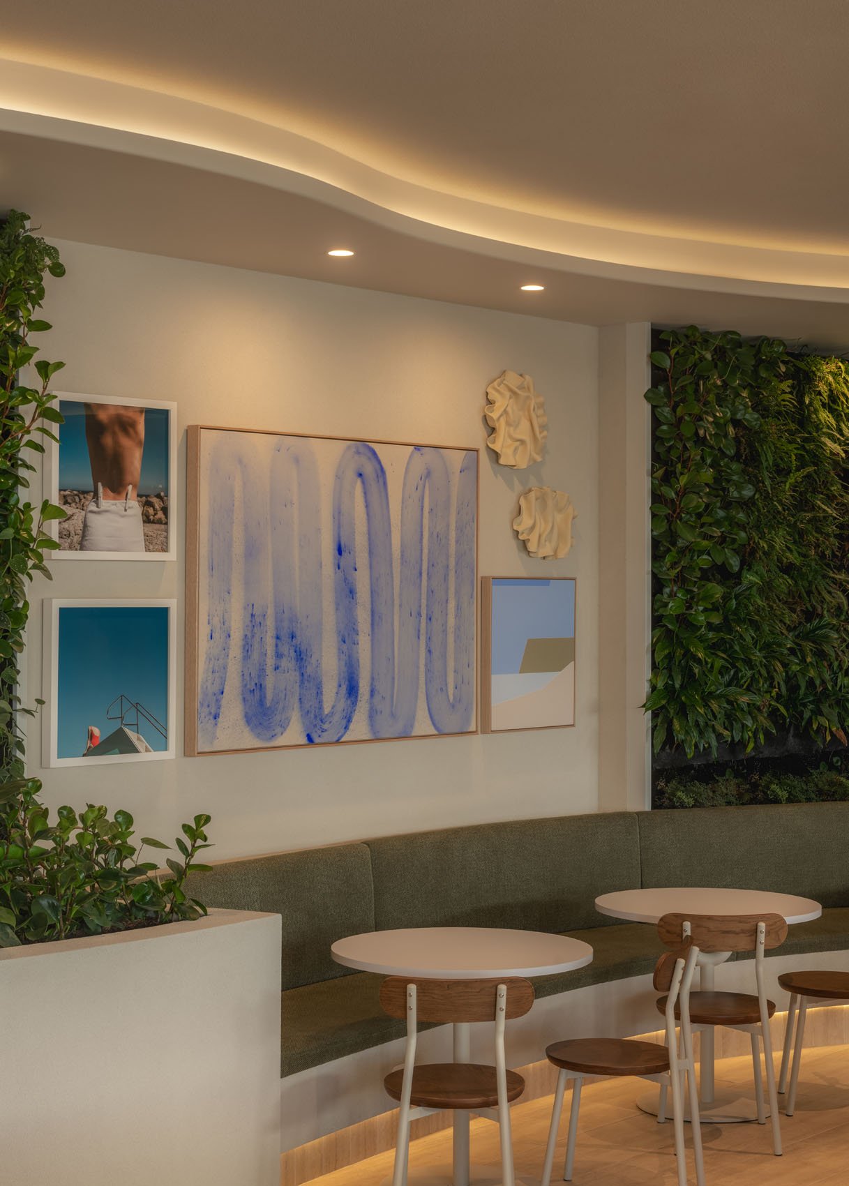 Co-working and relaxation area within luxury fitness environment