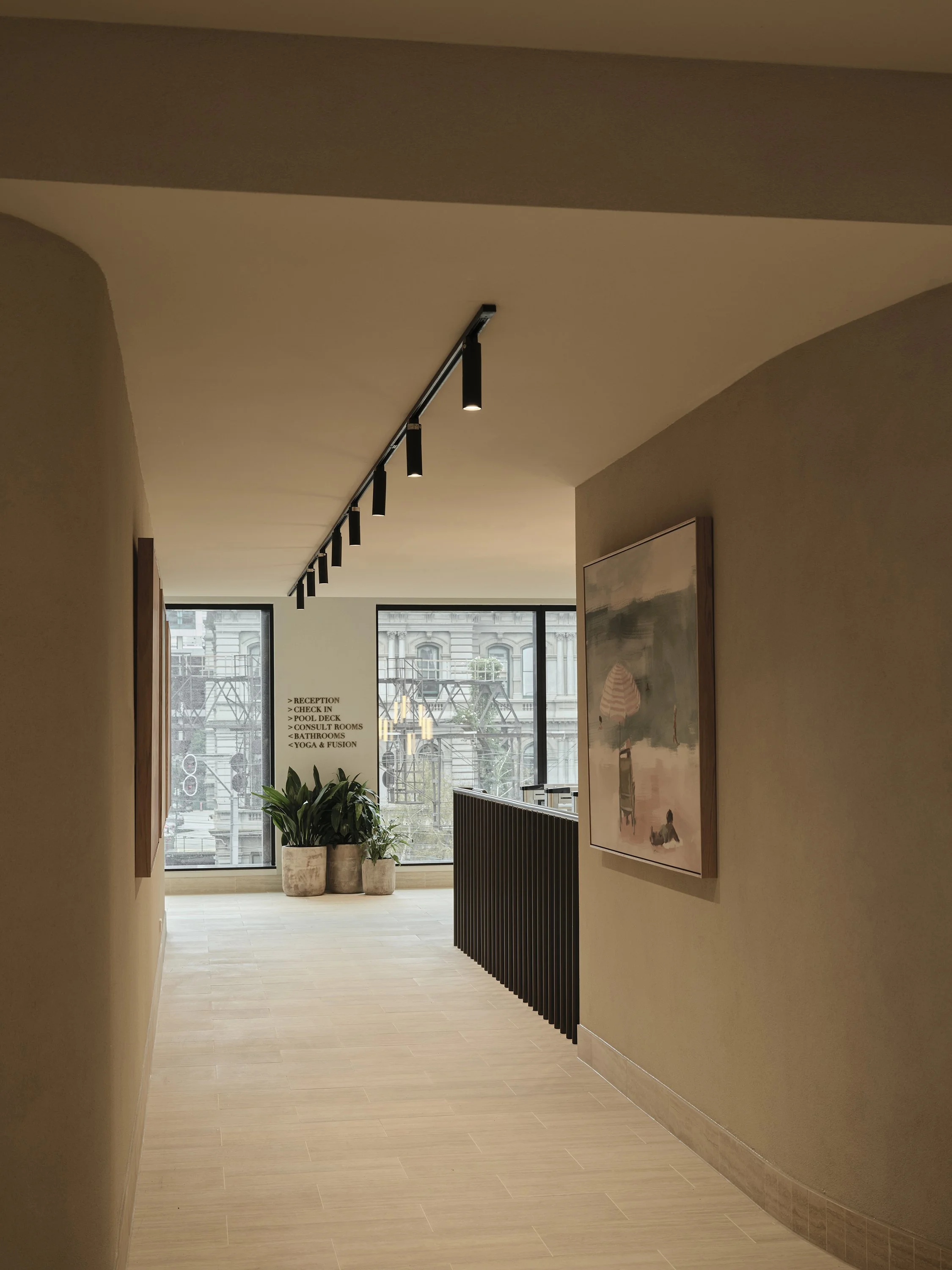 Luxury wellness centre interior with warm finishes and soft lighting