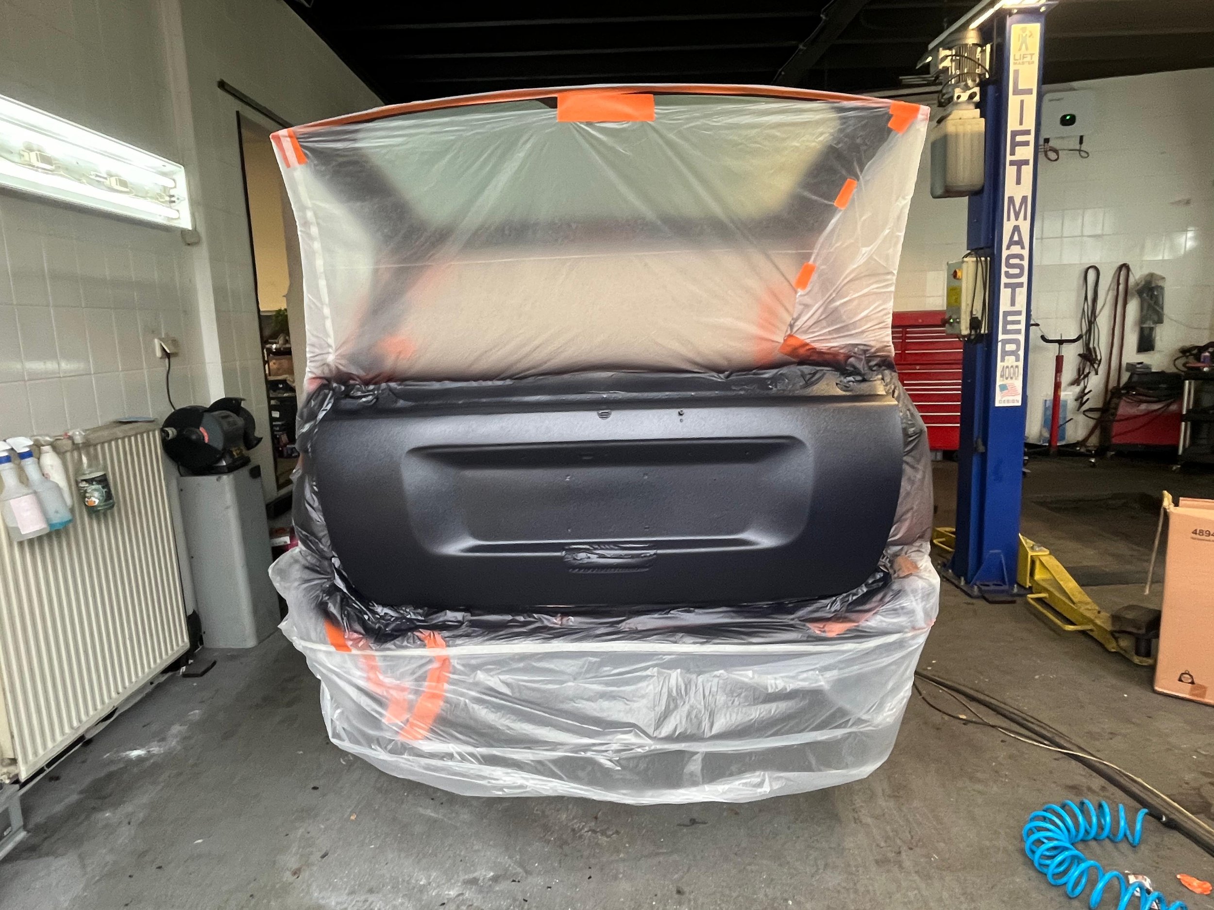 Fixed back door with Kevlar paint