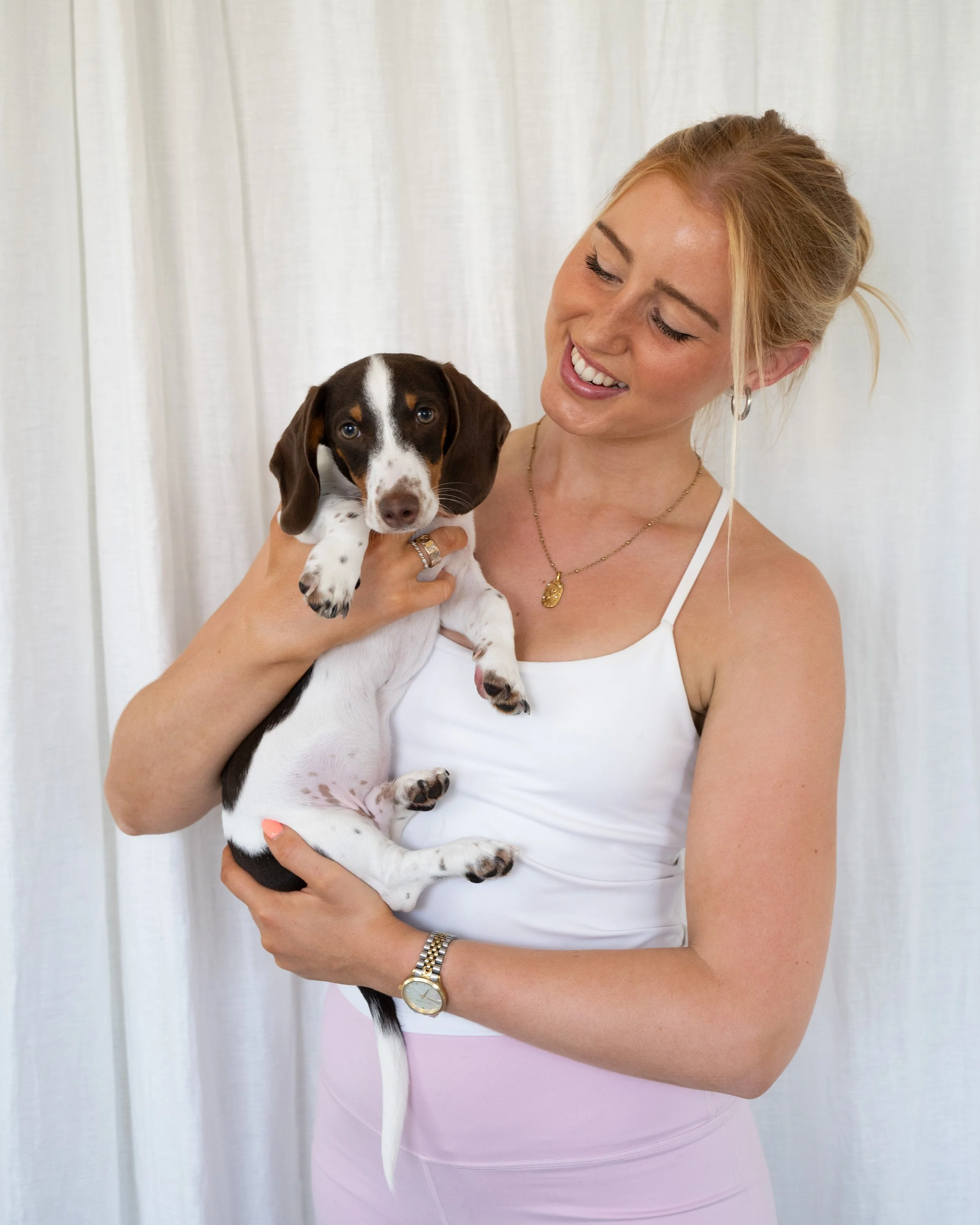 Woman holding puppy