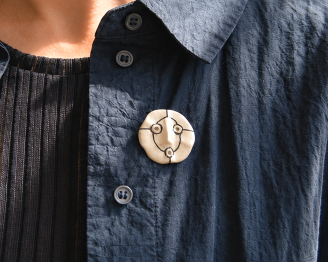 Broche visage